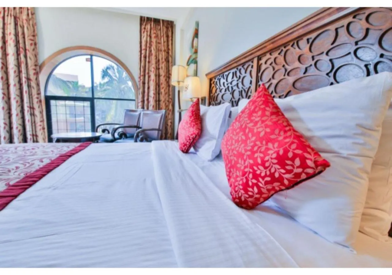 Bed in Neelam's The Grand Hotel Goa