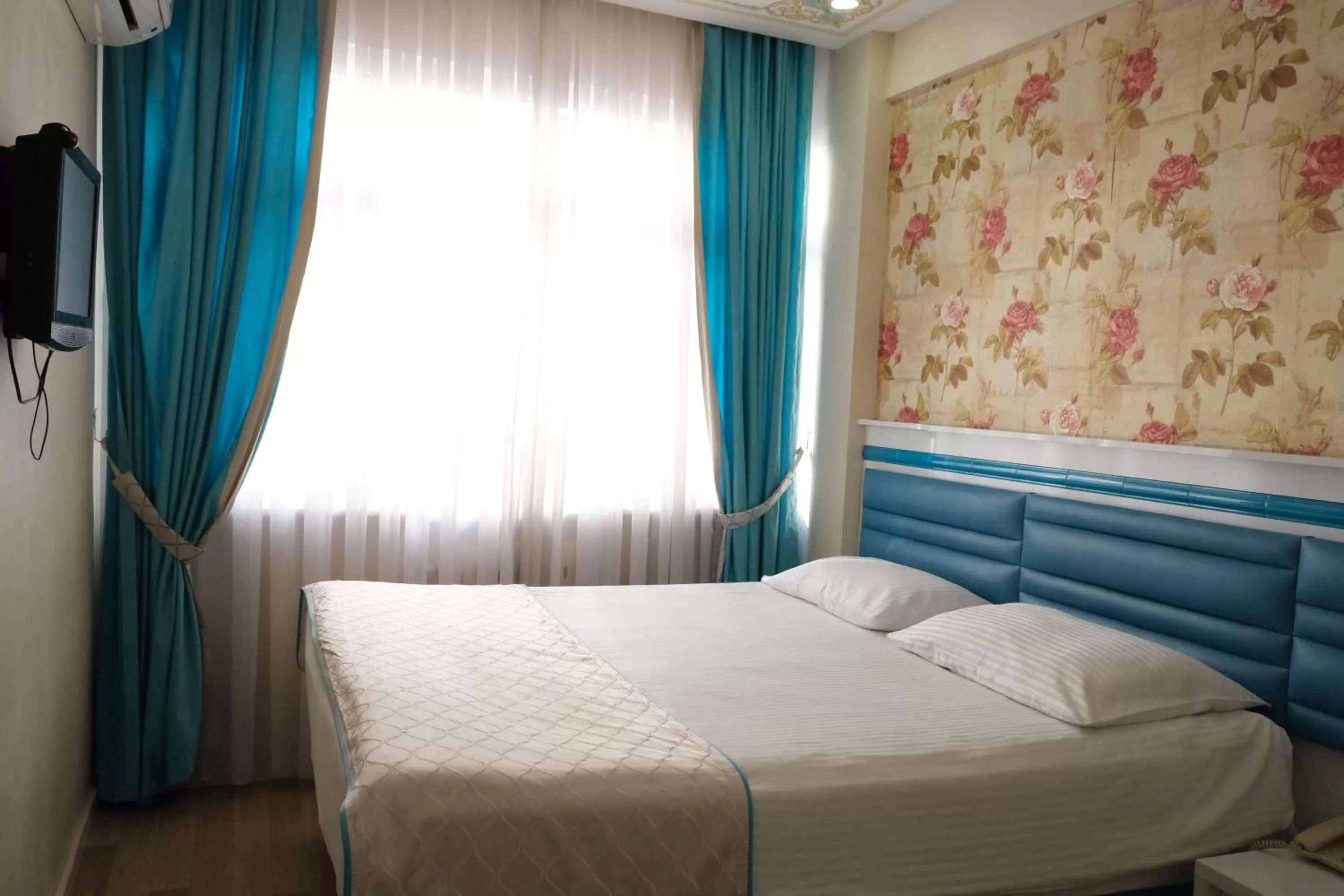 Bed in Star Holiday Hotel