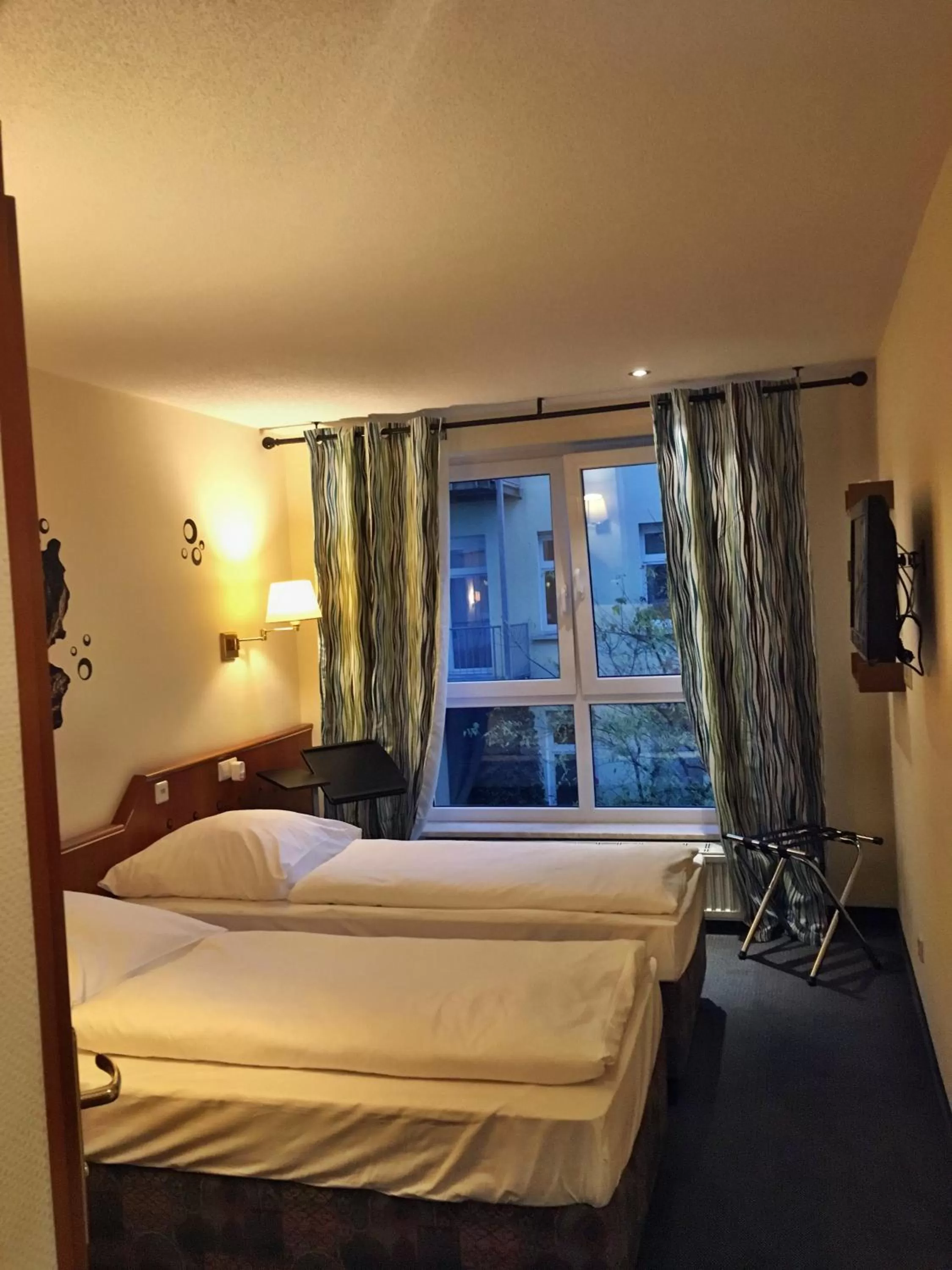 Photo of the whole room, Bed in Hotel Markgraf Leipzig