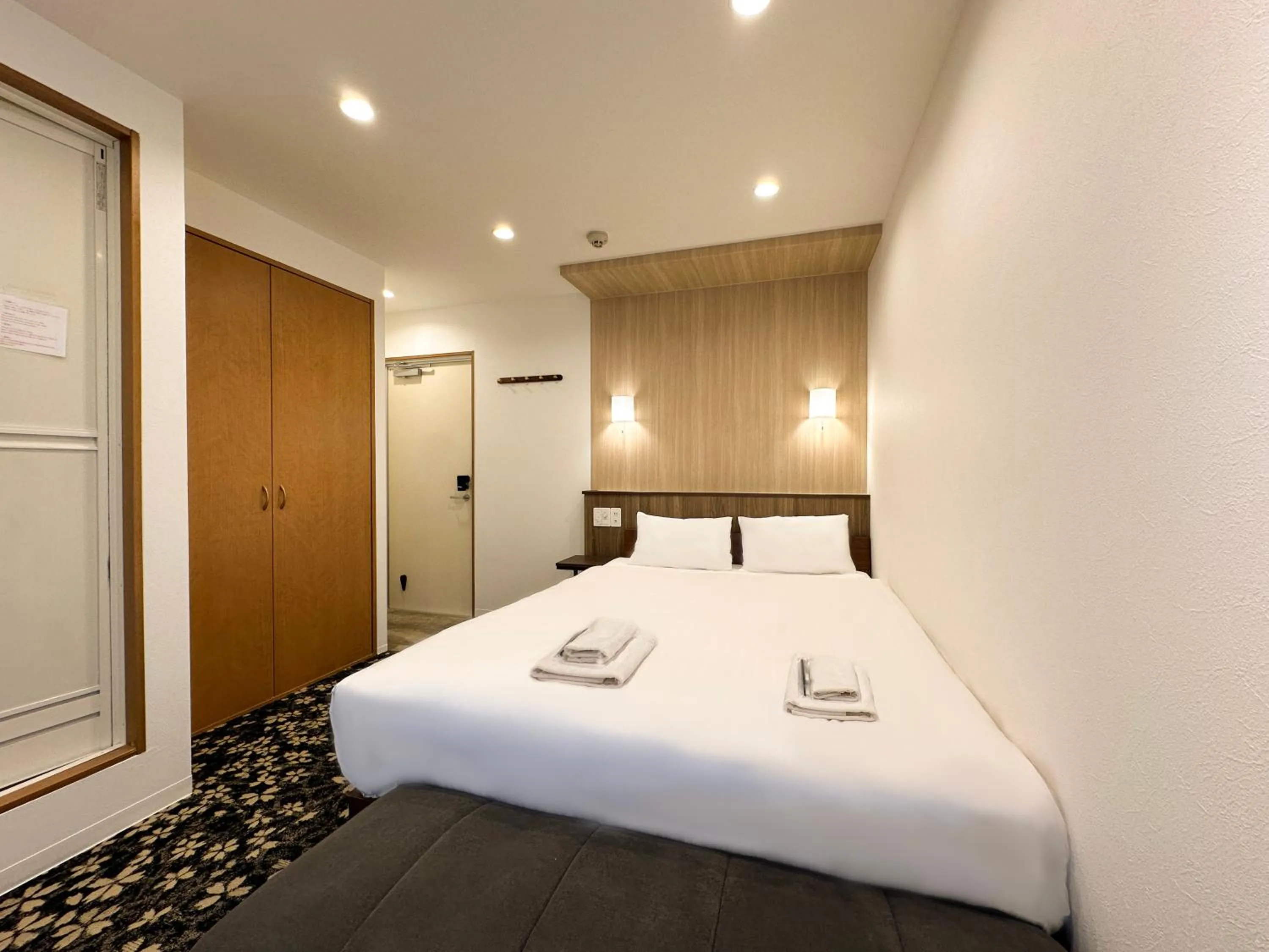 Bed in Osaka Ebisu Hotel