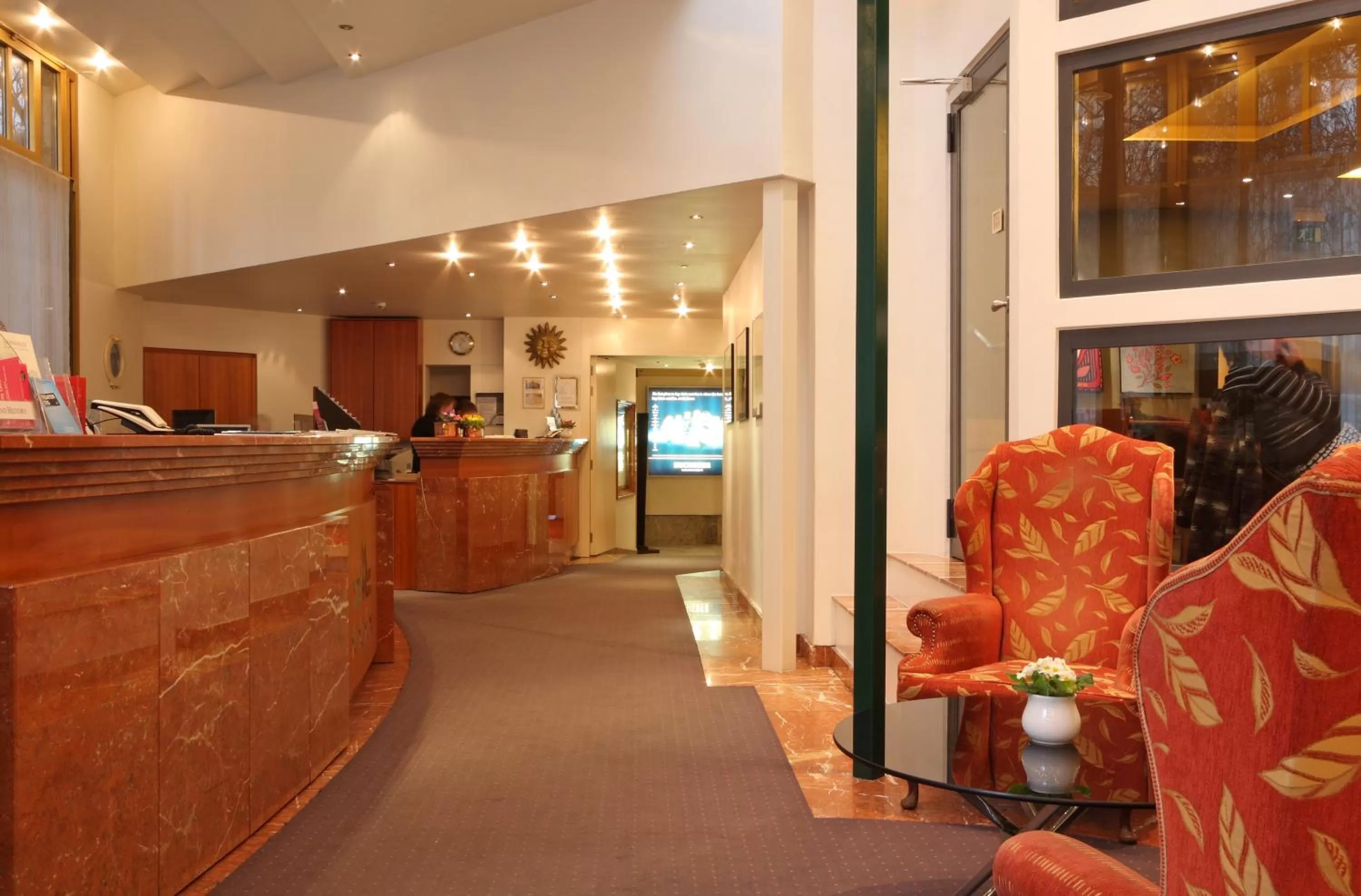 Lobby or reception in Hotel Monopol Luzern