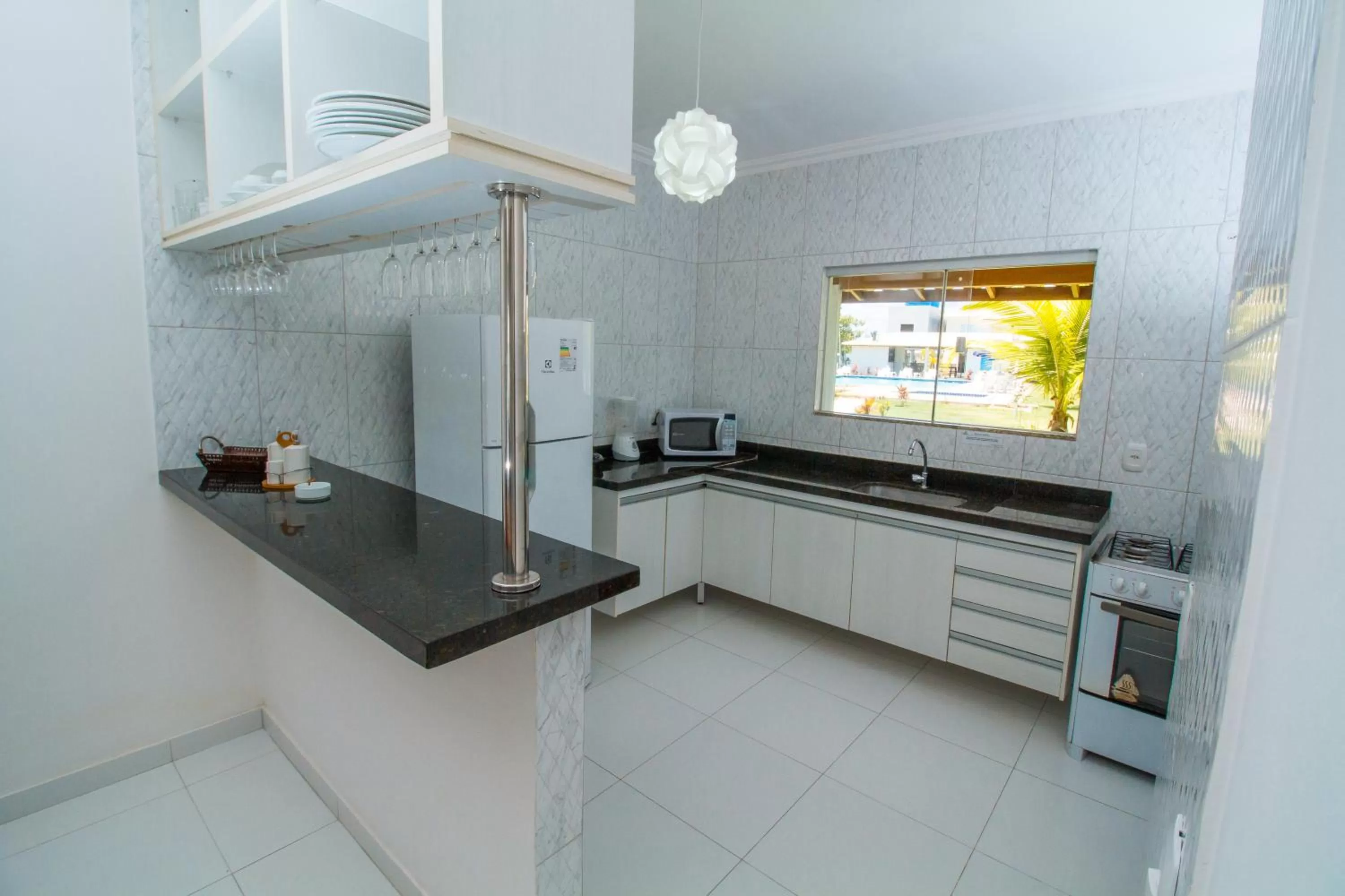 Kitchen or kitchenette in Porto Luar