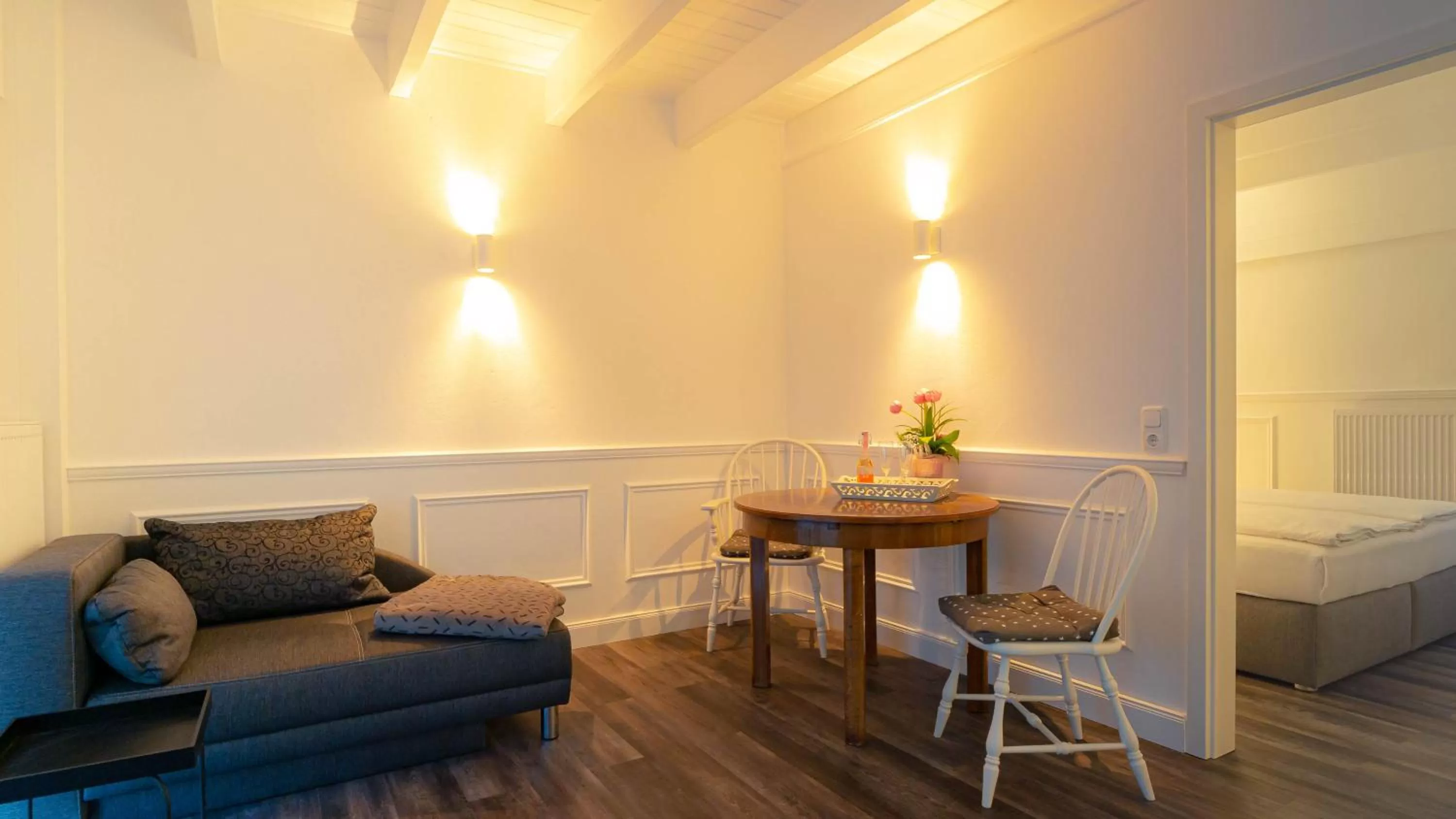 Living room, Bed in Rosenhof-Lodge