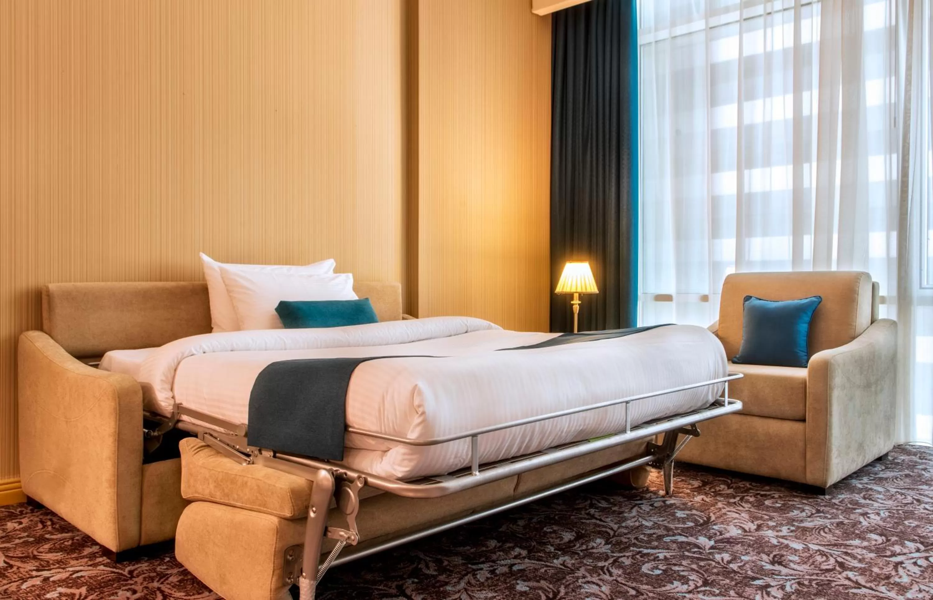 Bed in Golden Tulip Doha Hotel