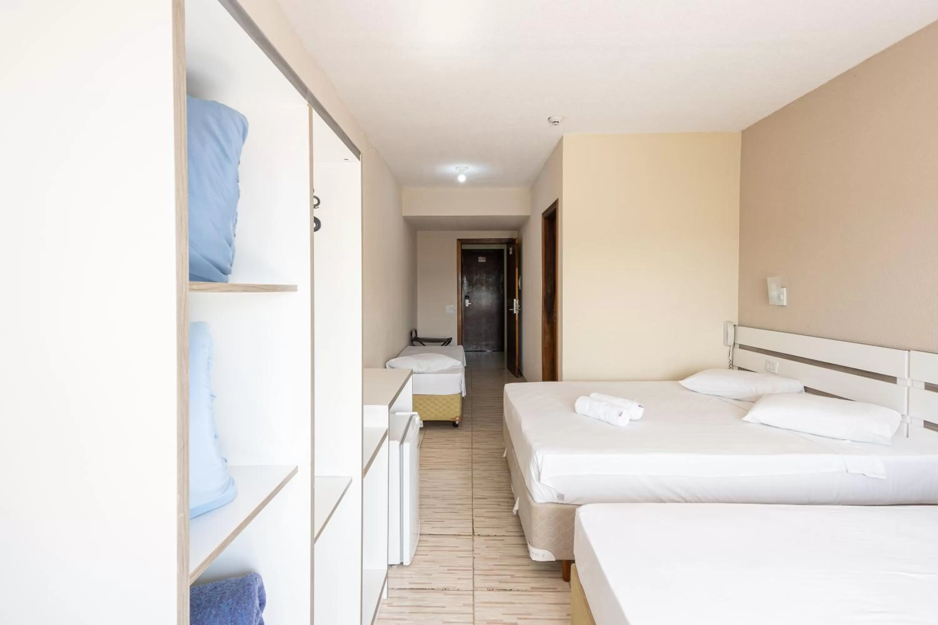 Bed in Hotel Conexão