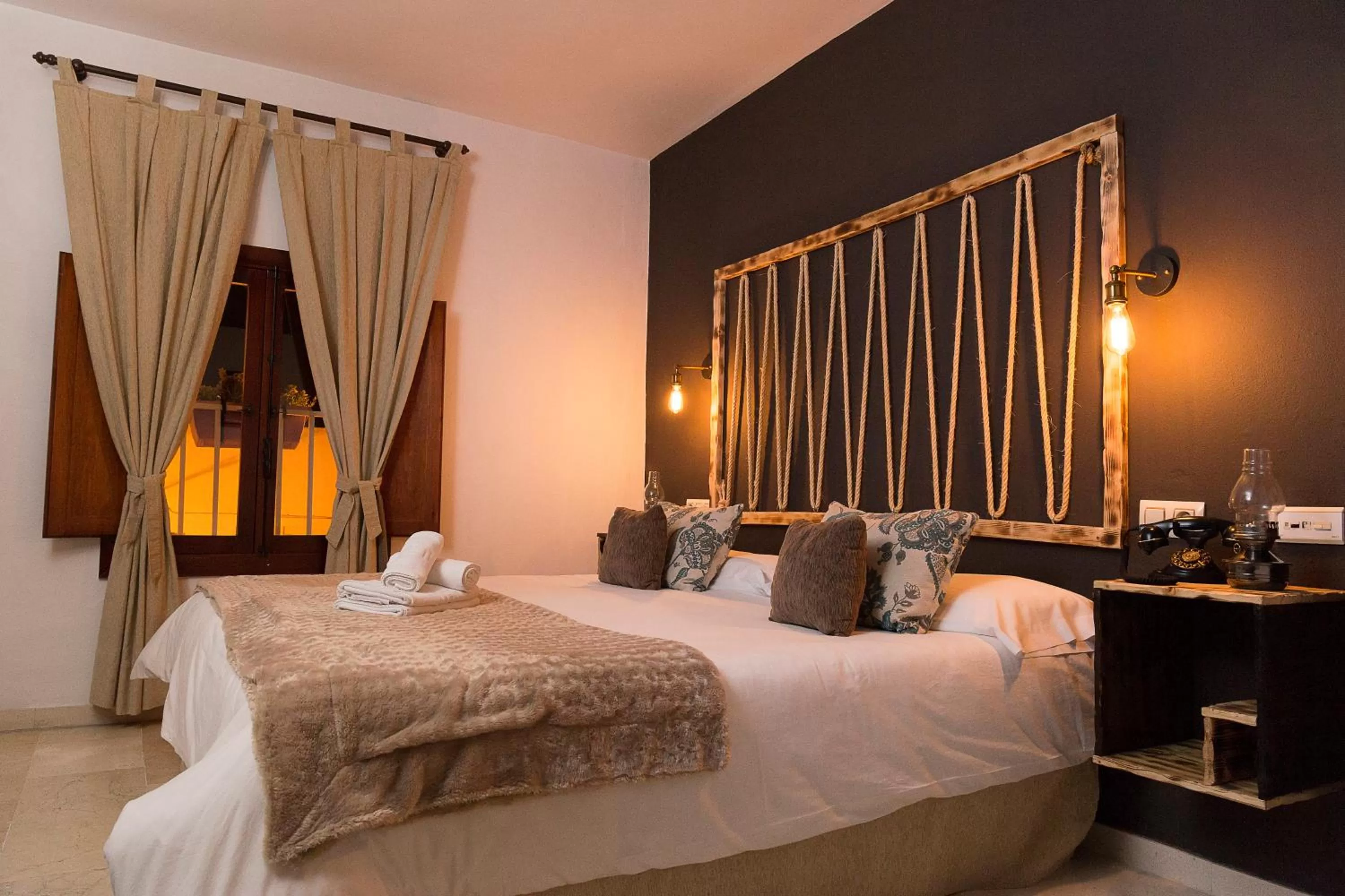 Bed in Hotel Posada de las Cuevas