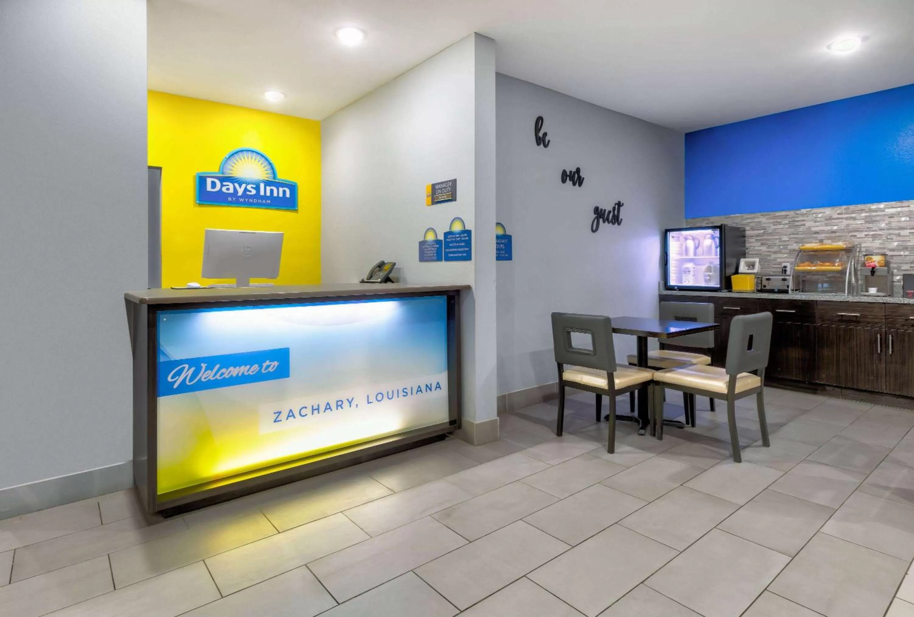 Lobby or reception in Days Inn by Wyndham Zachary LA