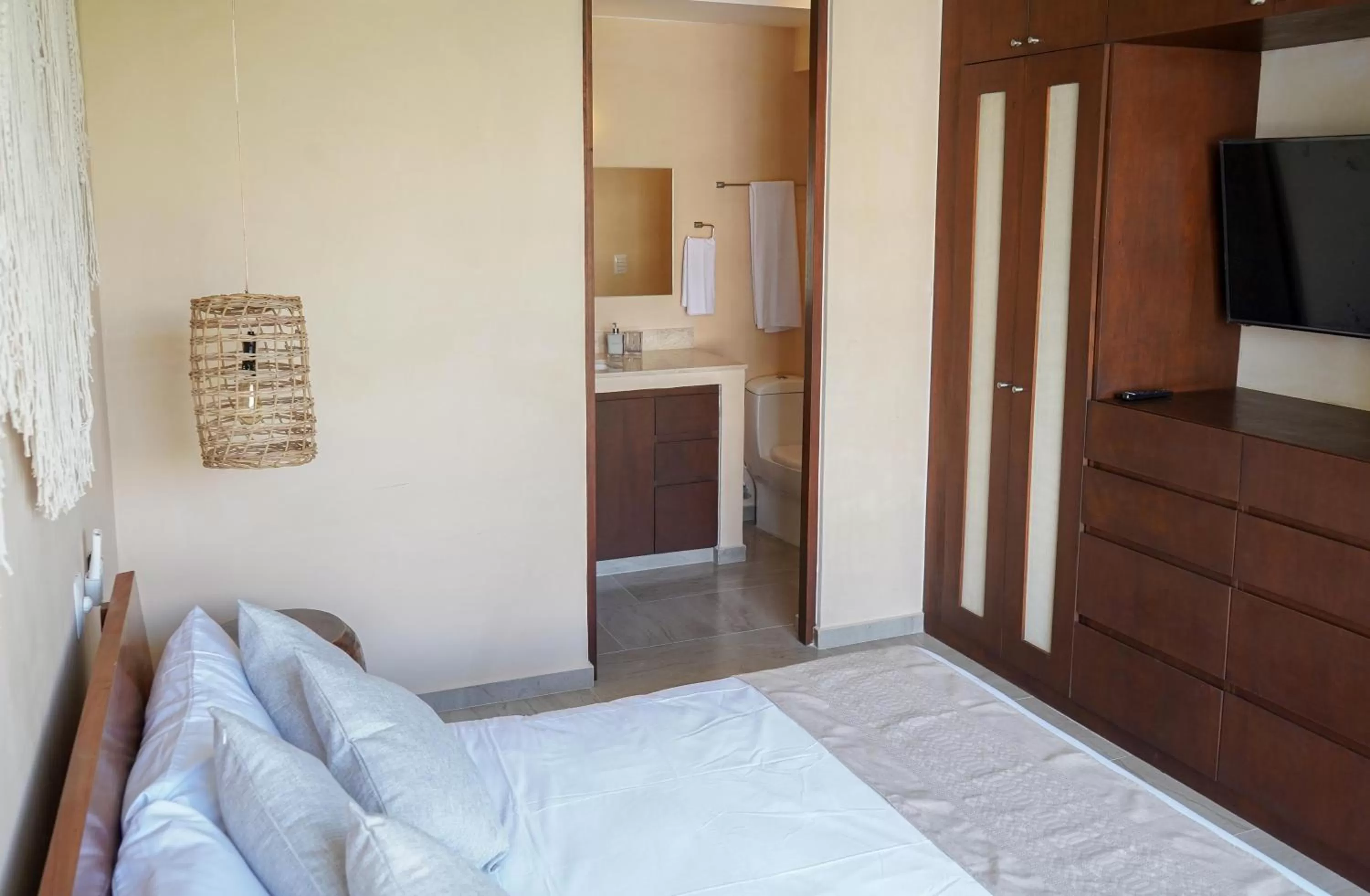 Bed in ARUNA TULUM-Luxury Studios & Apartments
