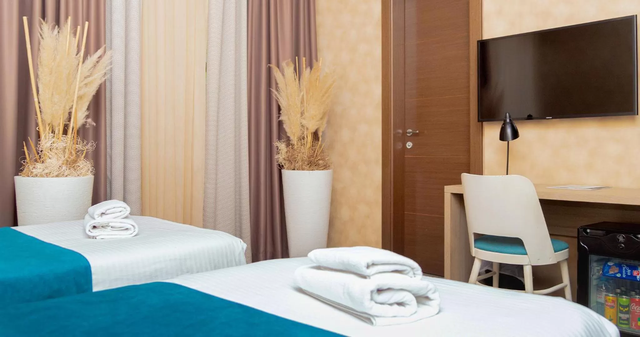 Photo of the whole room, Bed in Garni Hotel Mint