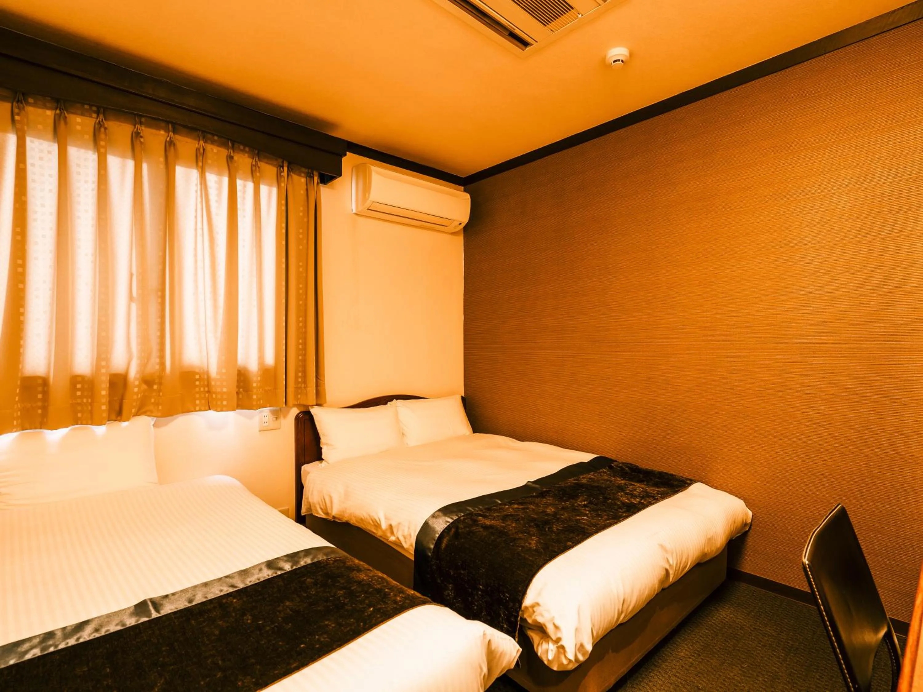 Photo of the whole room, Bed in Hotel AreaOne Takamatsu