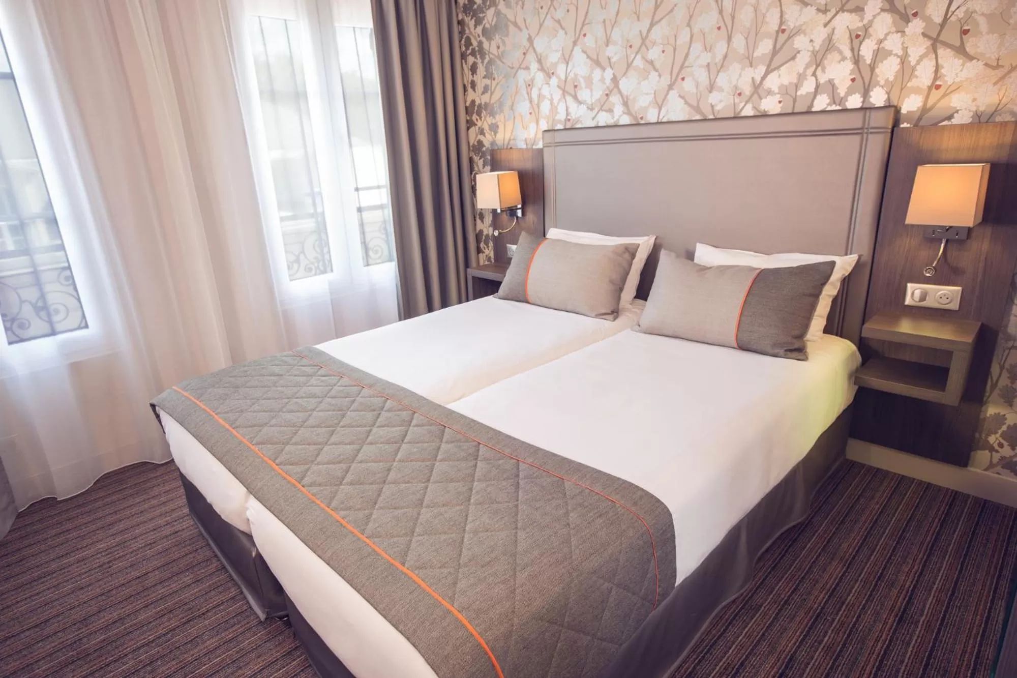 Photo of the whole room, Bed in Timhotel Paris Gare de l'Est