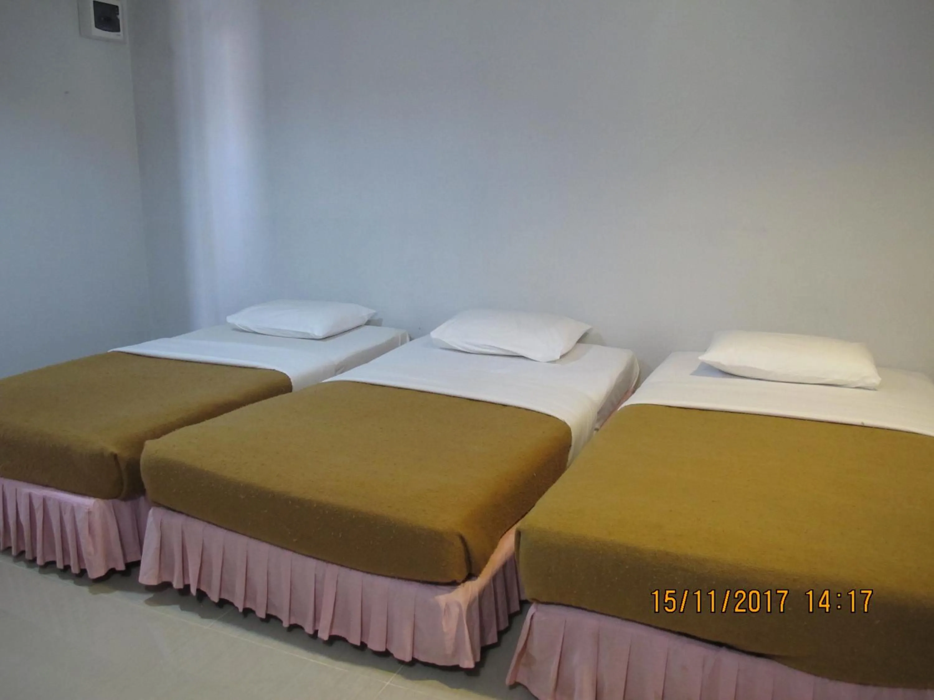 Bed in Tongpoon Hotel