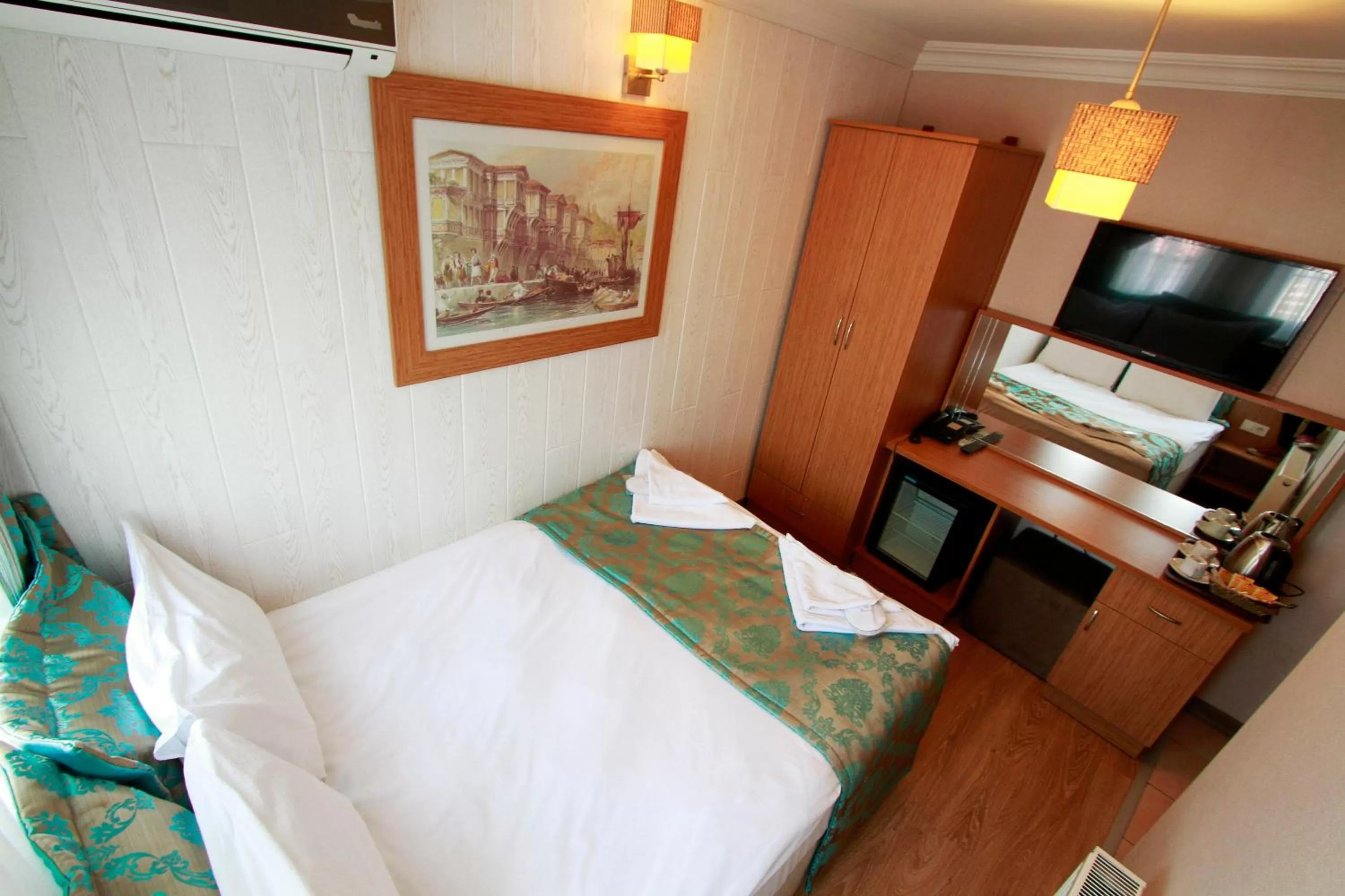 Bed in Agora Boutique Hotel & Bistro