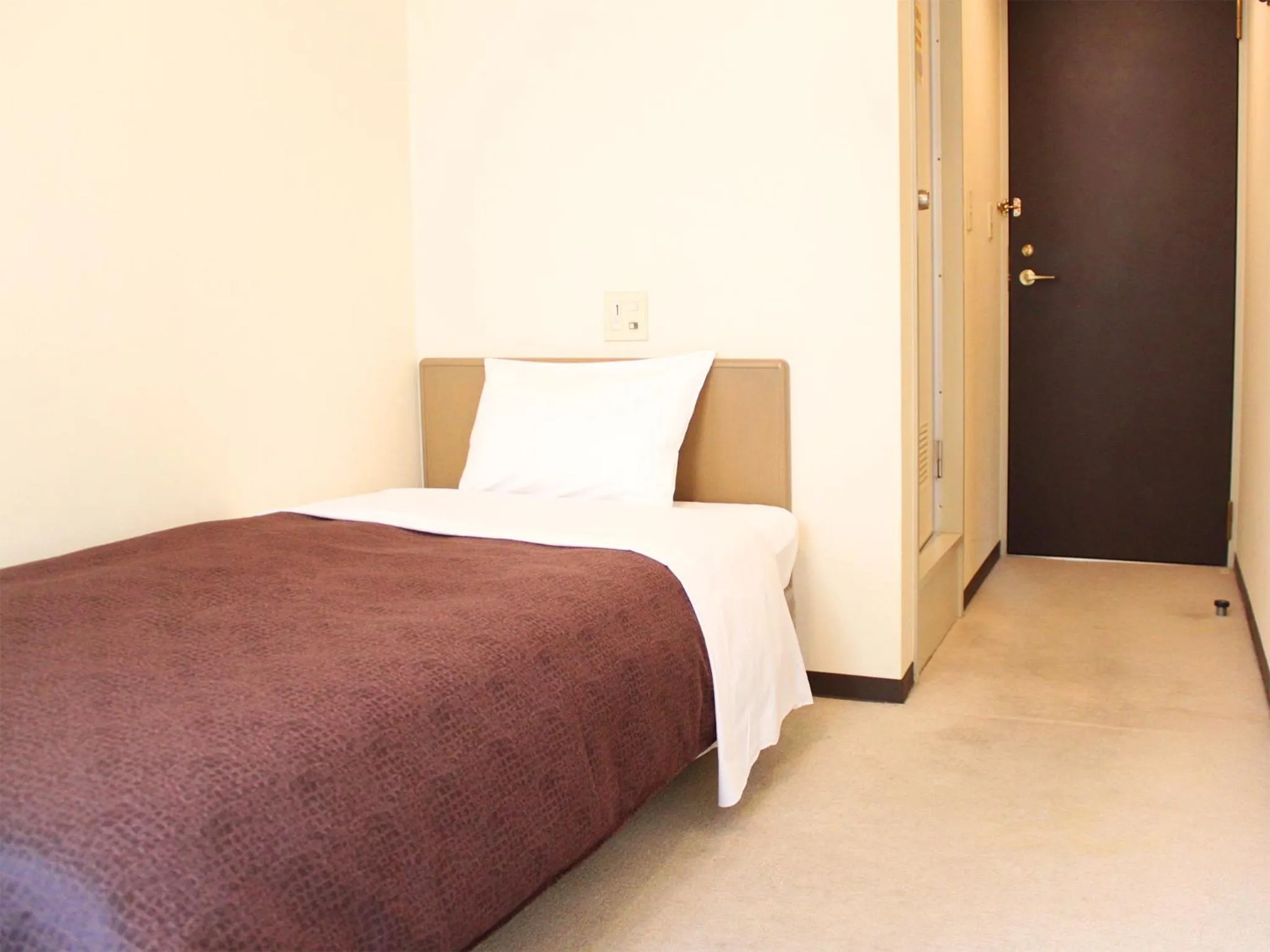 Bed in HOTEL LiVEMAX BUDGET Tokyo Kiba