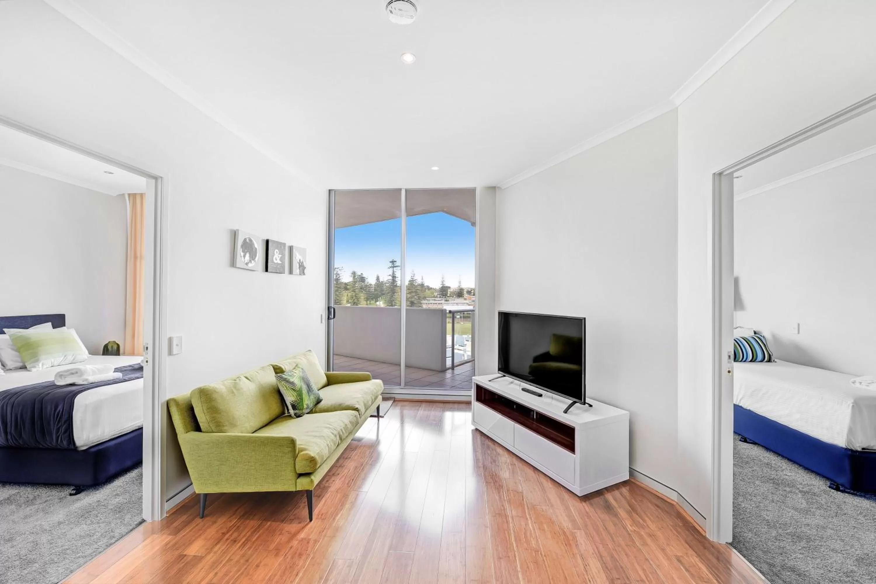 Bed, Seating Area in Sandcastle Apartments