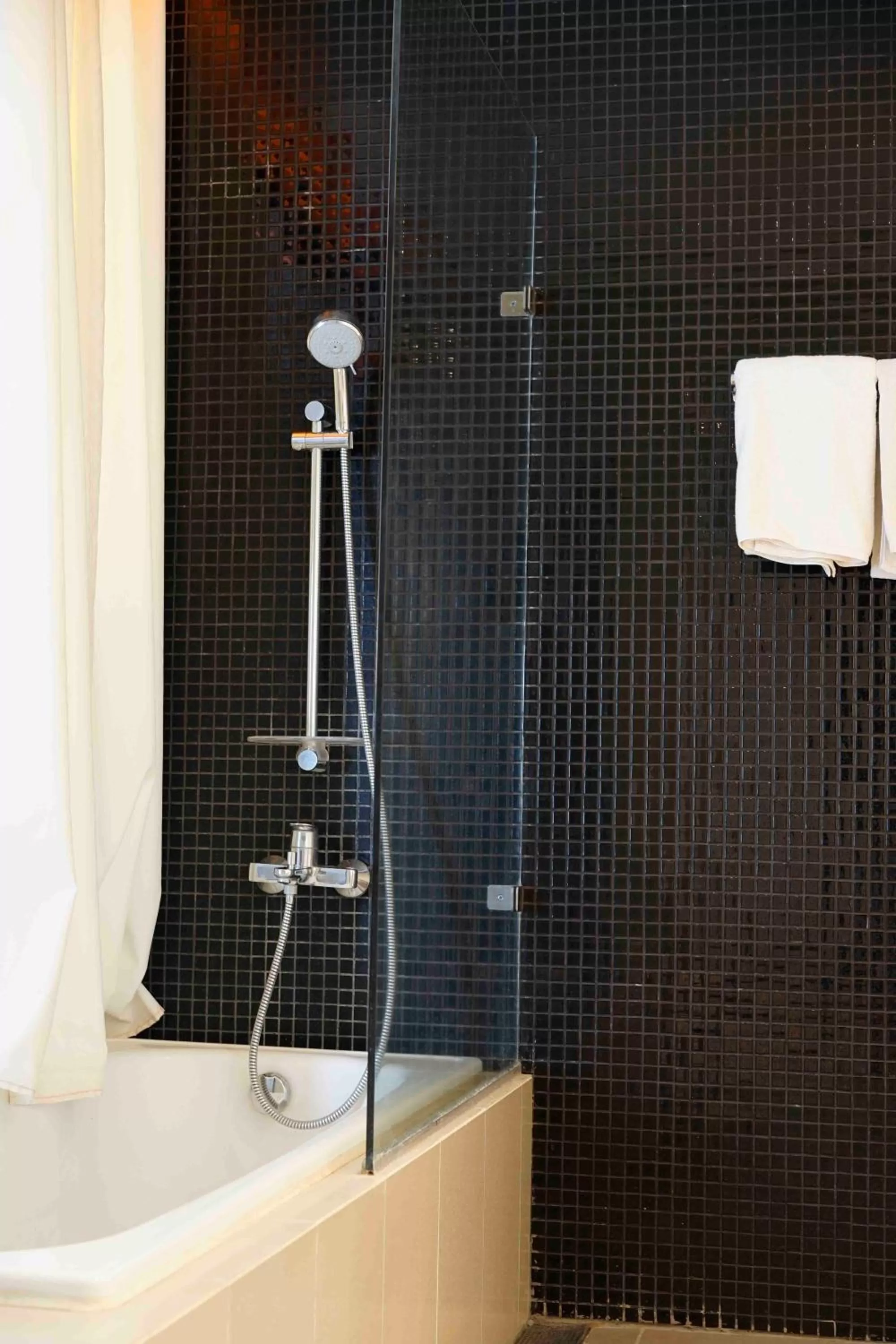 Bathroom in Yunna Hotel Lampung