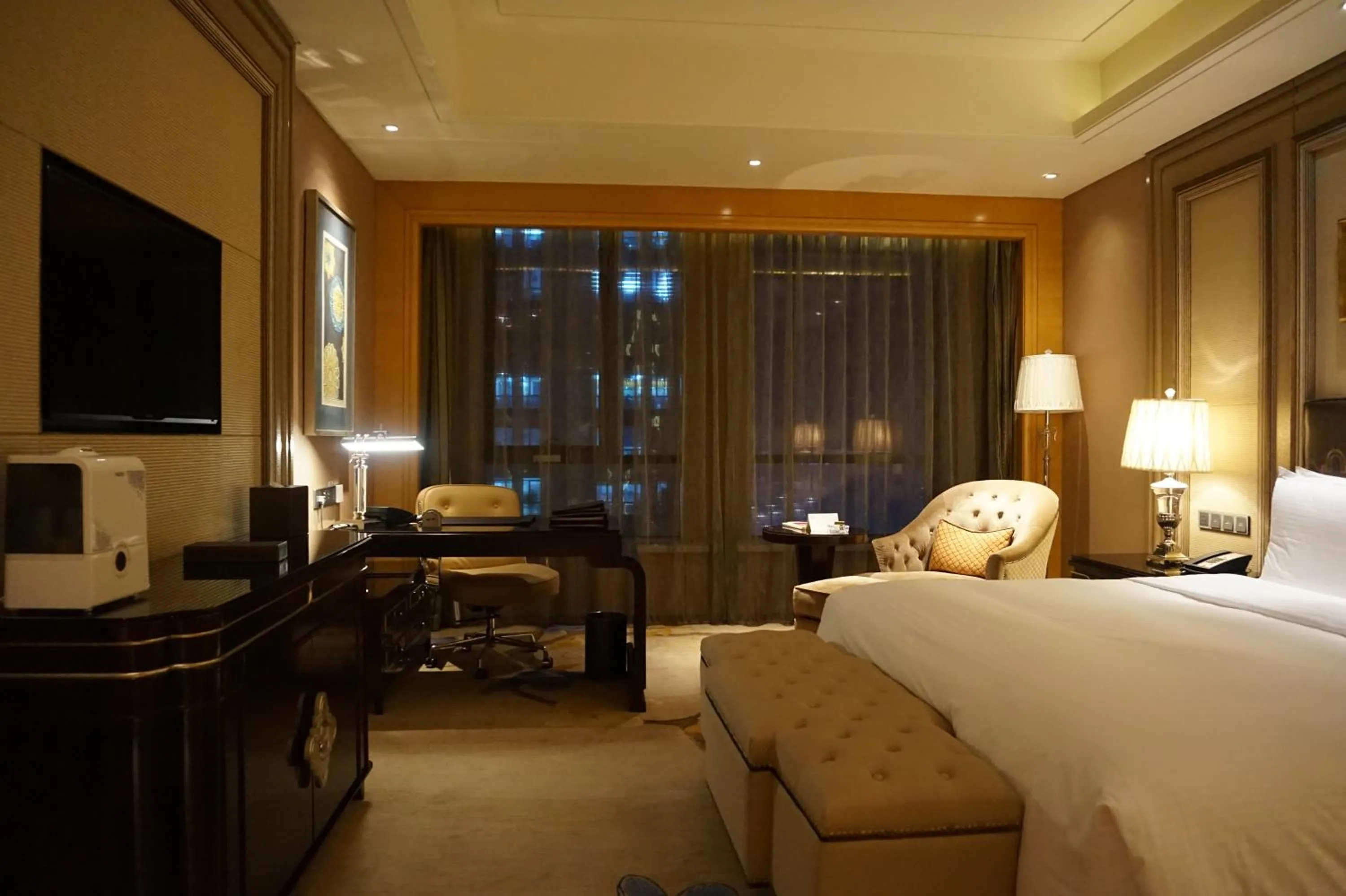 Bed in Wanda Realm Harbin Hotel