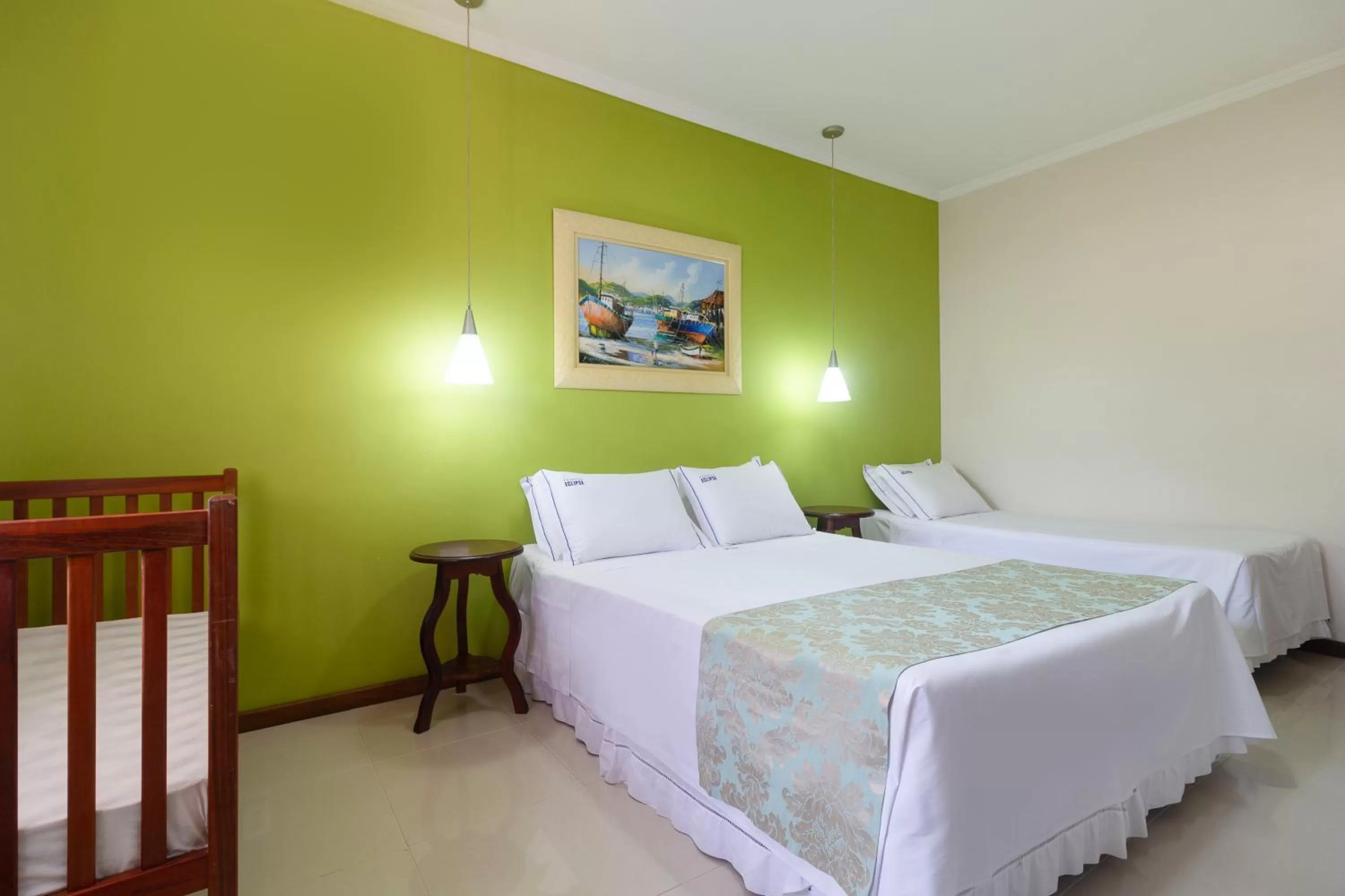 Bed in Pousada Eclipse Paraty