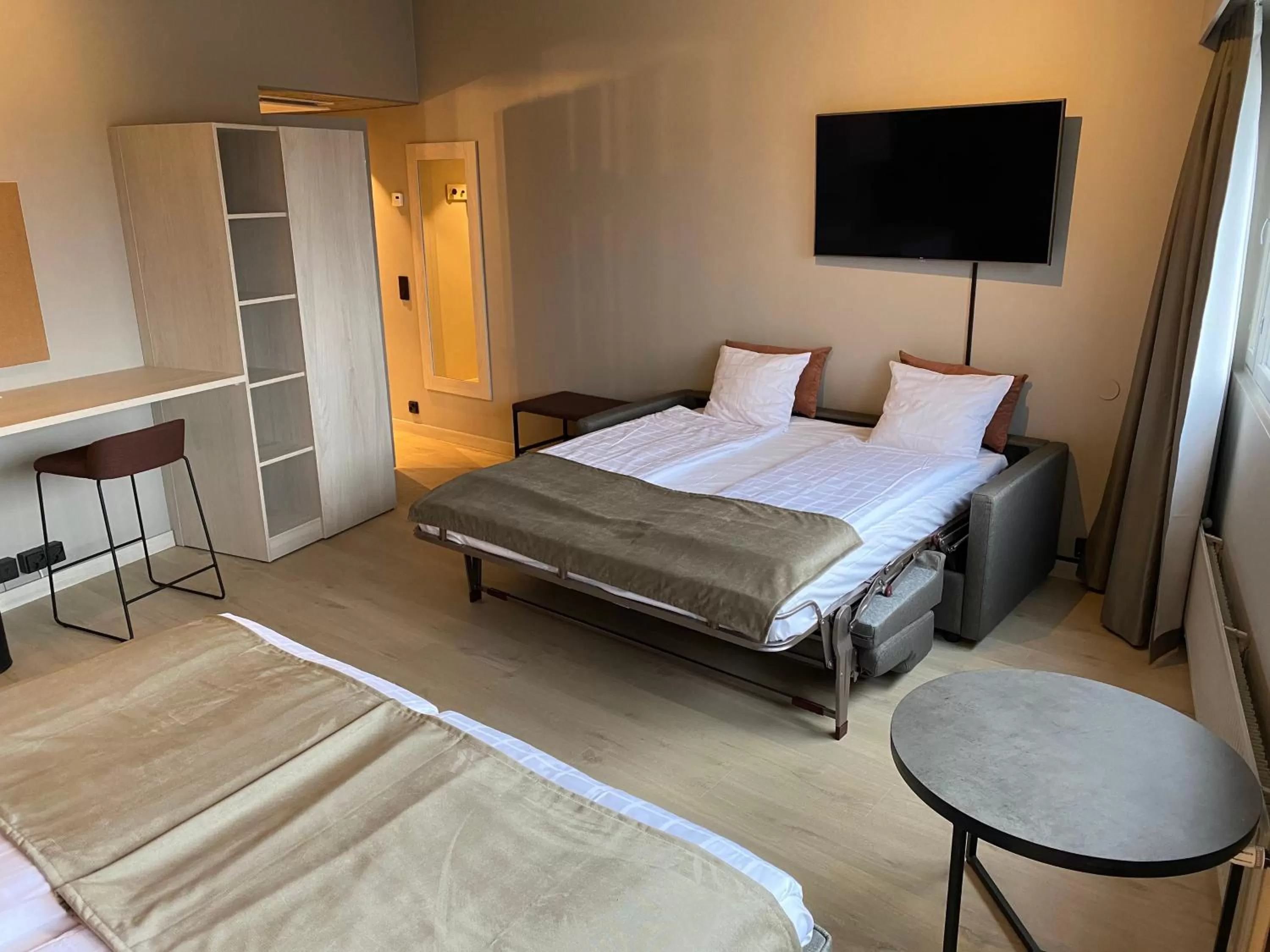 Bed in Skyline Airport Hotel