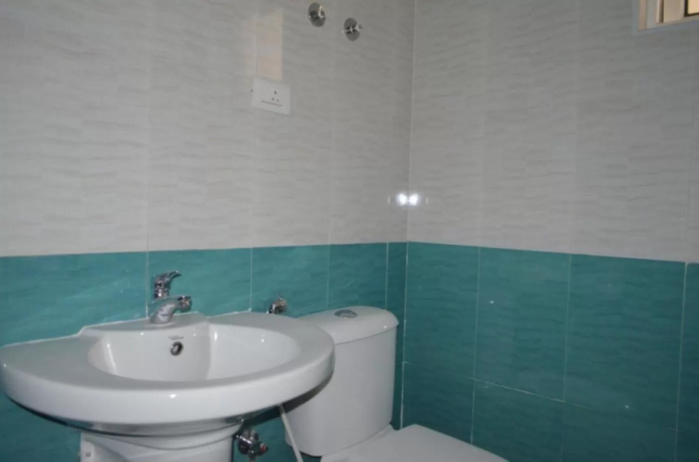 Toilet in Zingle Stay Airport Hotel