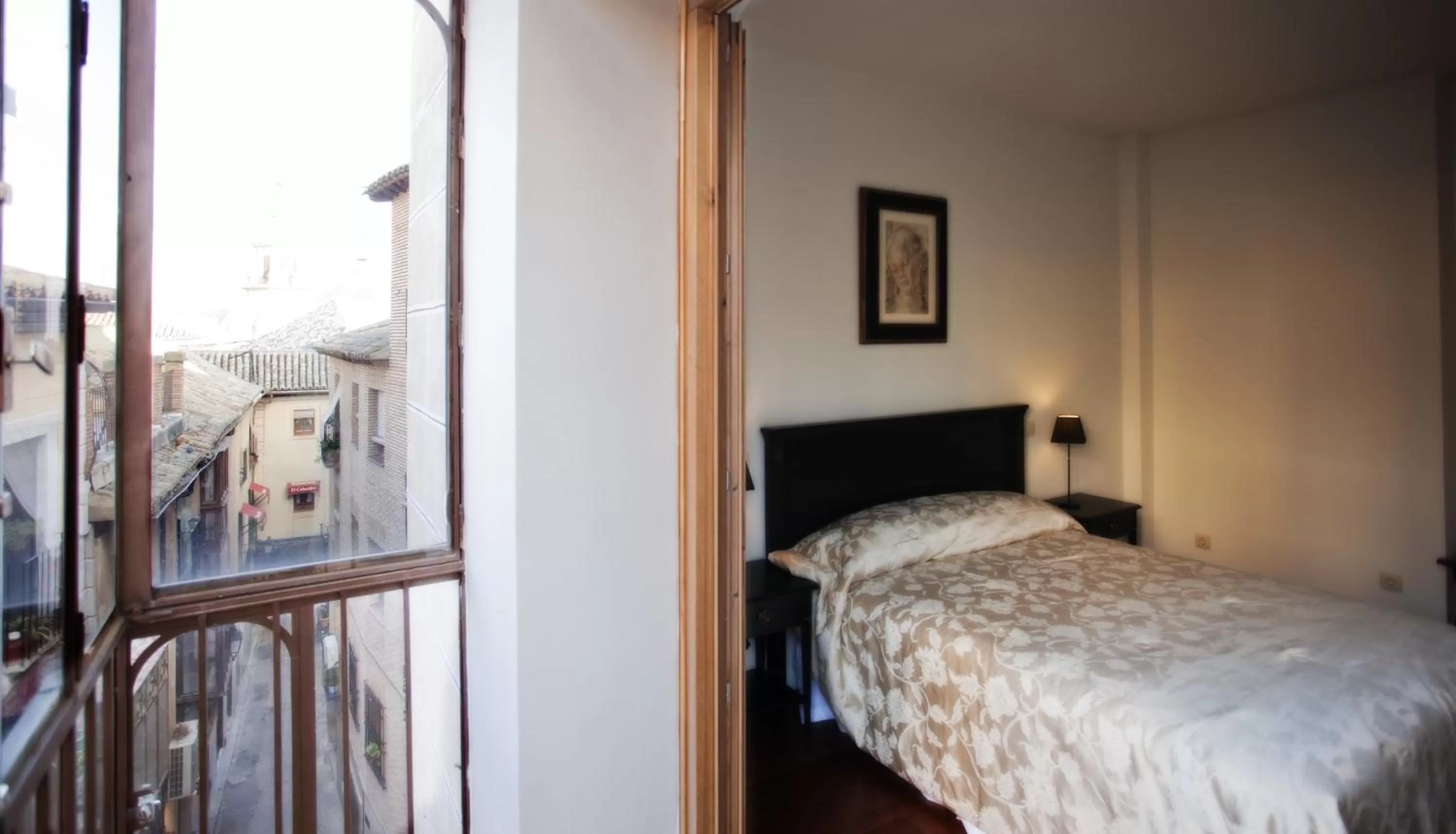 Bed in Casa Urbana Suites