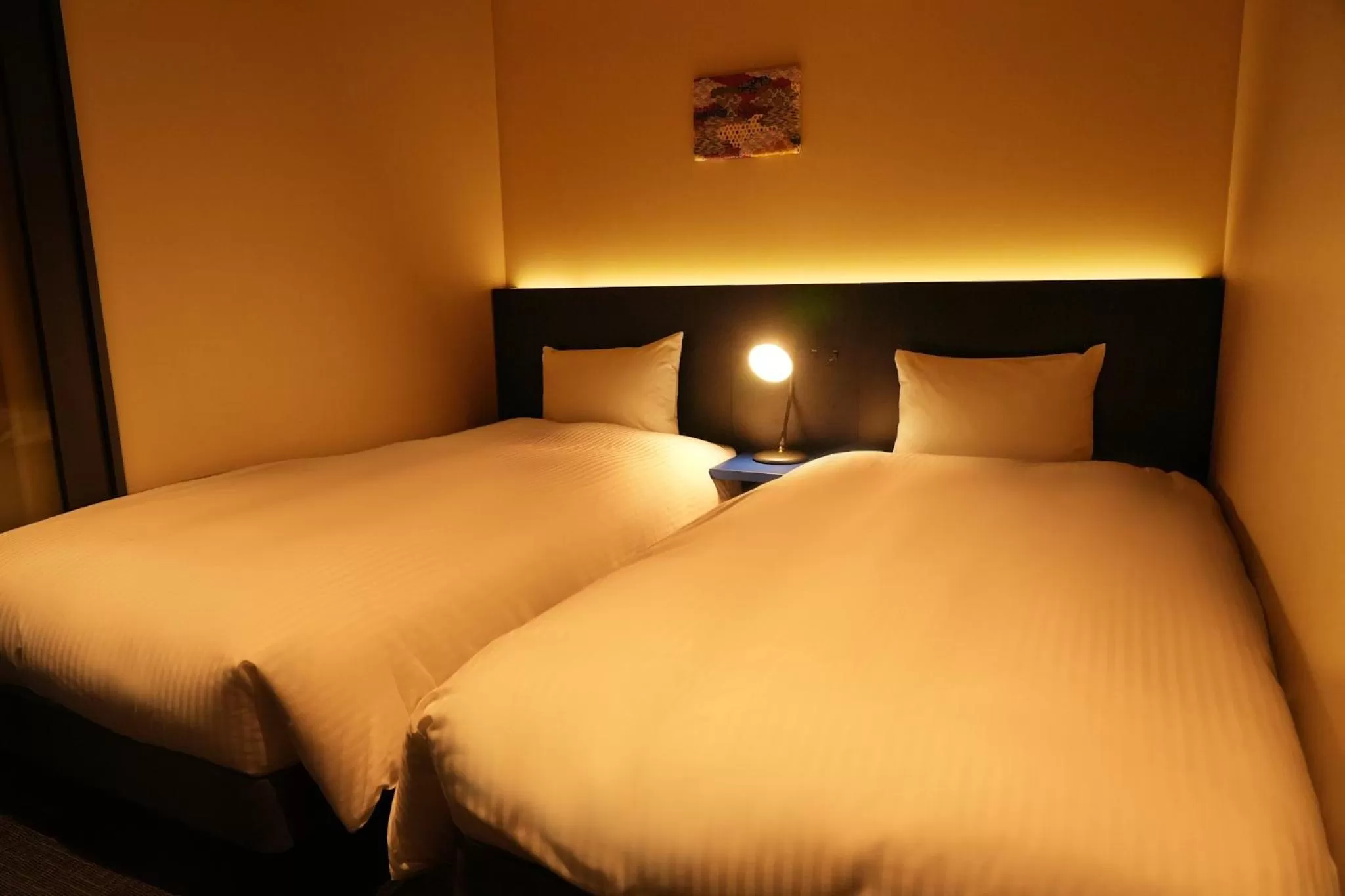 Bed in NPlus Hotel Higashikanda-akihabara