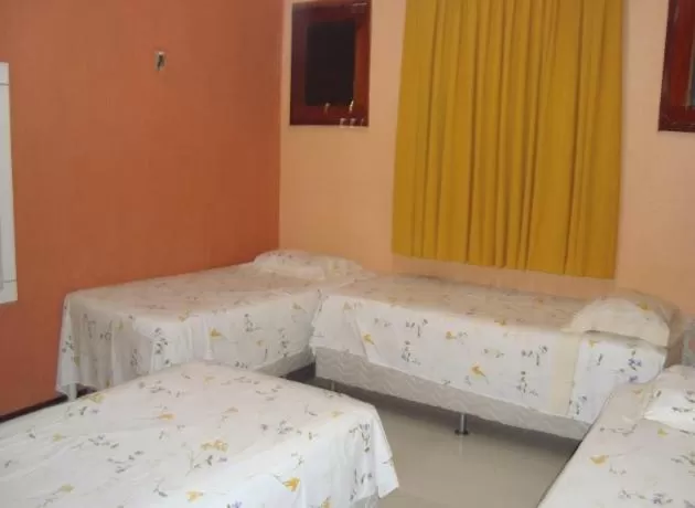 Bed in Pousada Vianna's