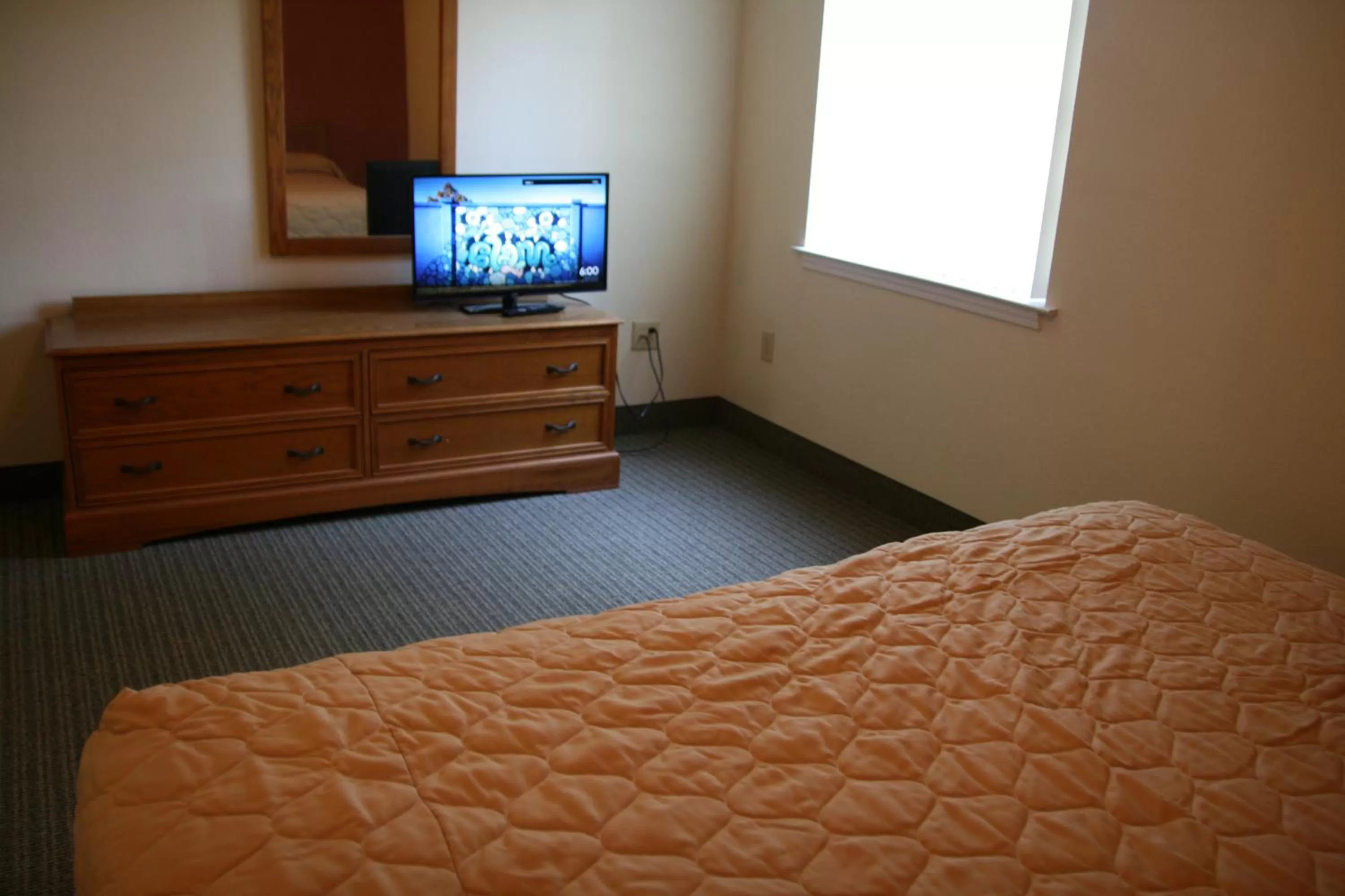 Bed in Affordable Suites Rocky Mount