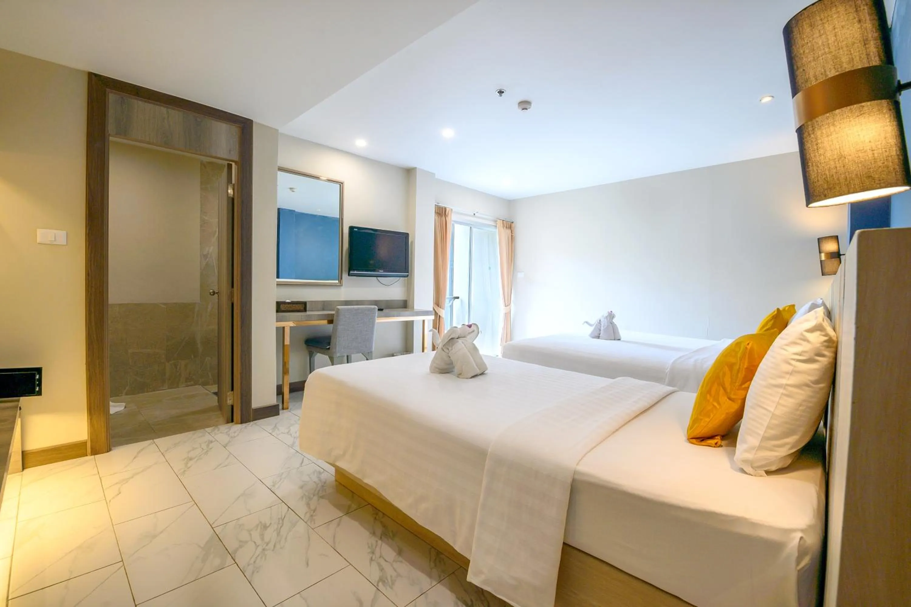 Bed in Andakira Hotel - SHA Extra Plus