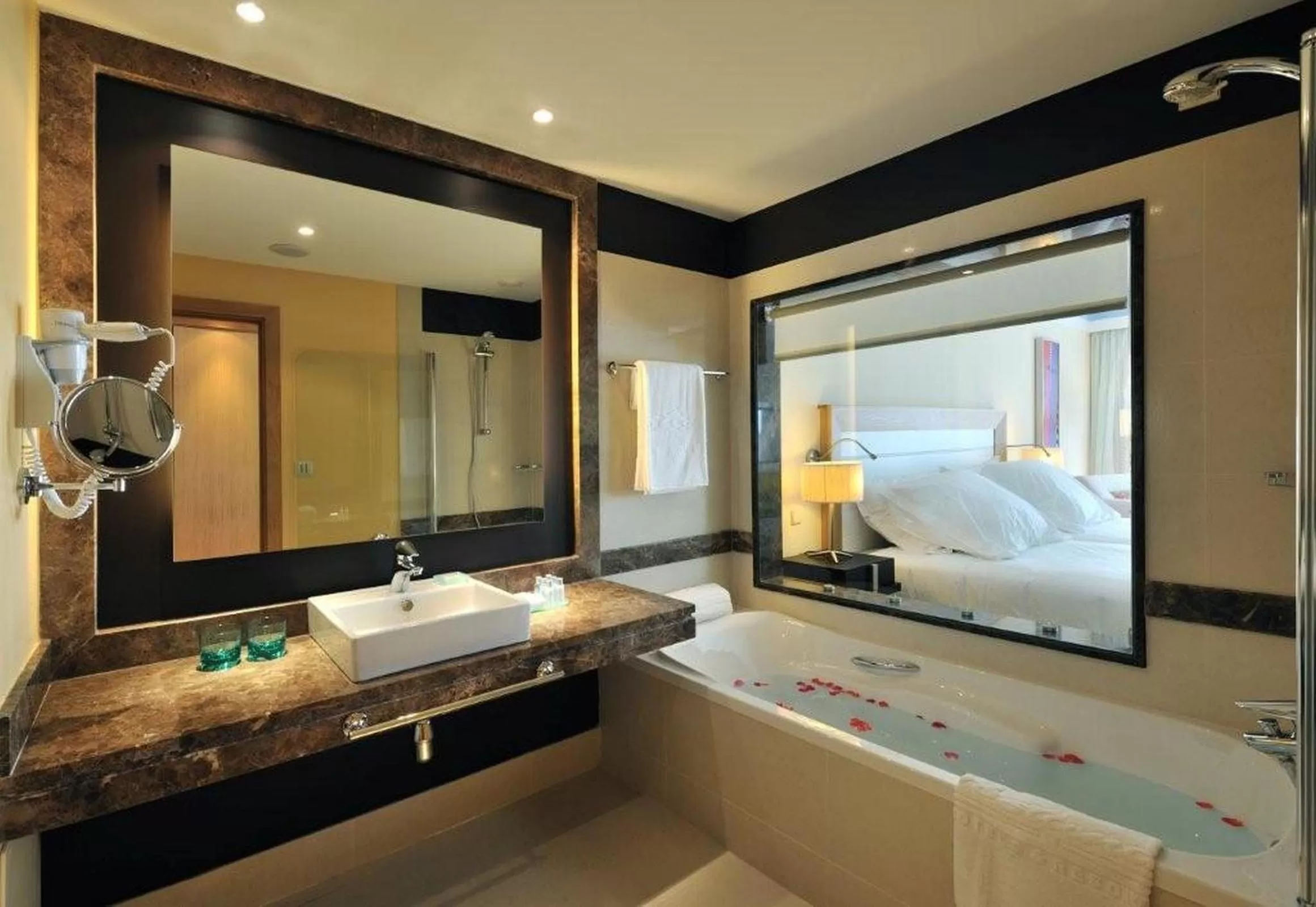 Bathroom, Bed in Pestana Promenade Ocean Resort Hotel