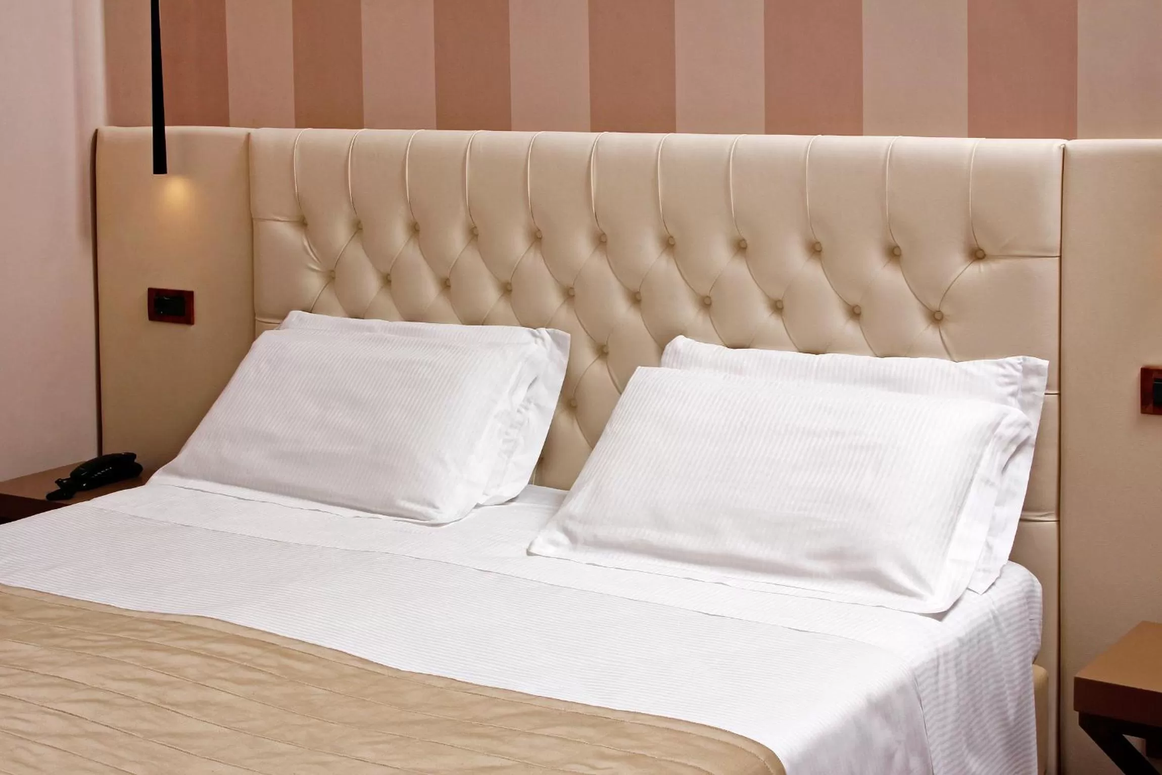 Bed in Hotel Arcangelo