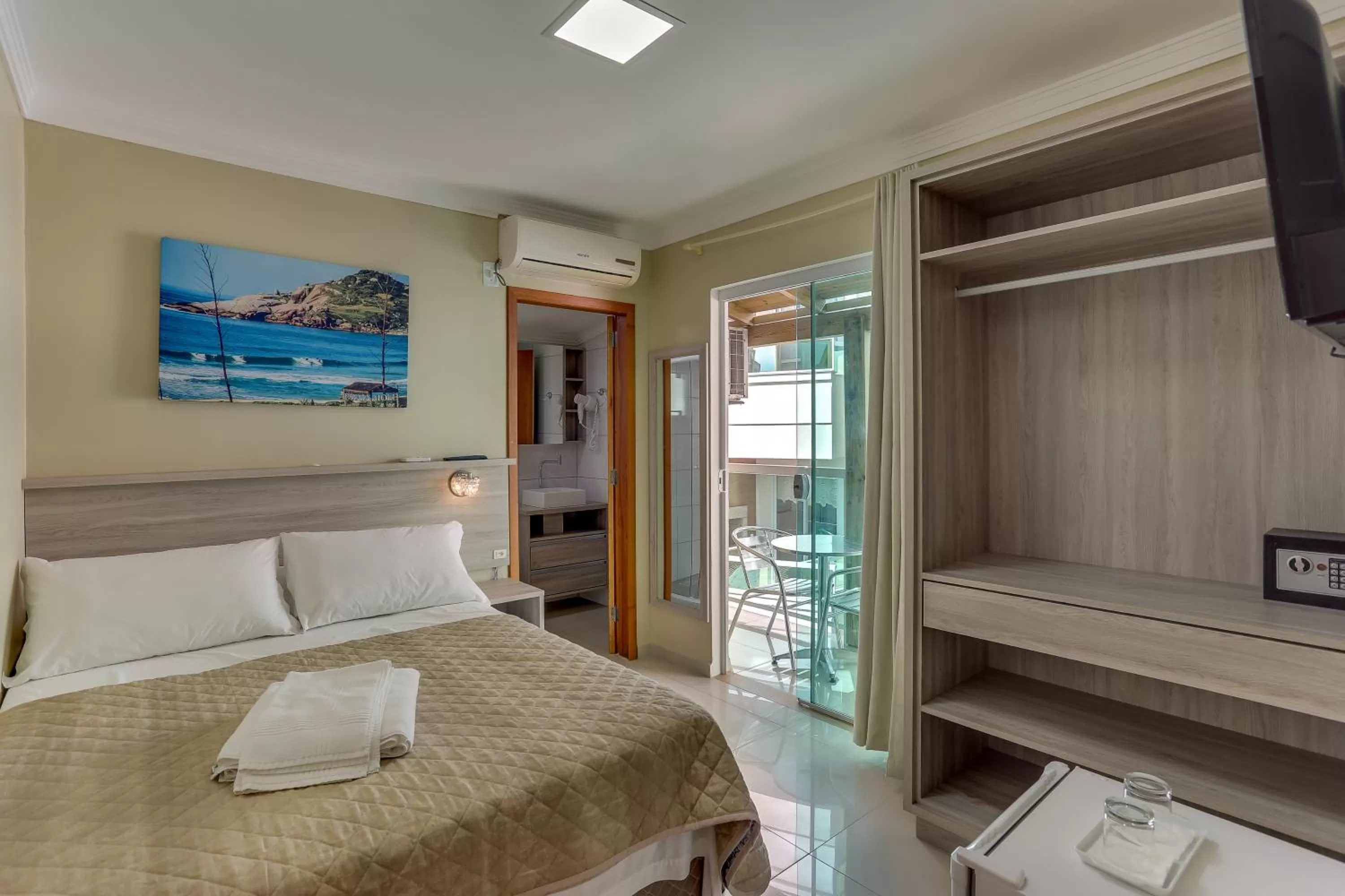 Bed in Pousada Tissiano