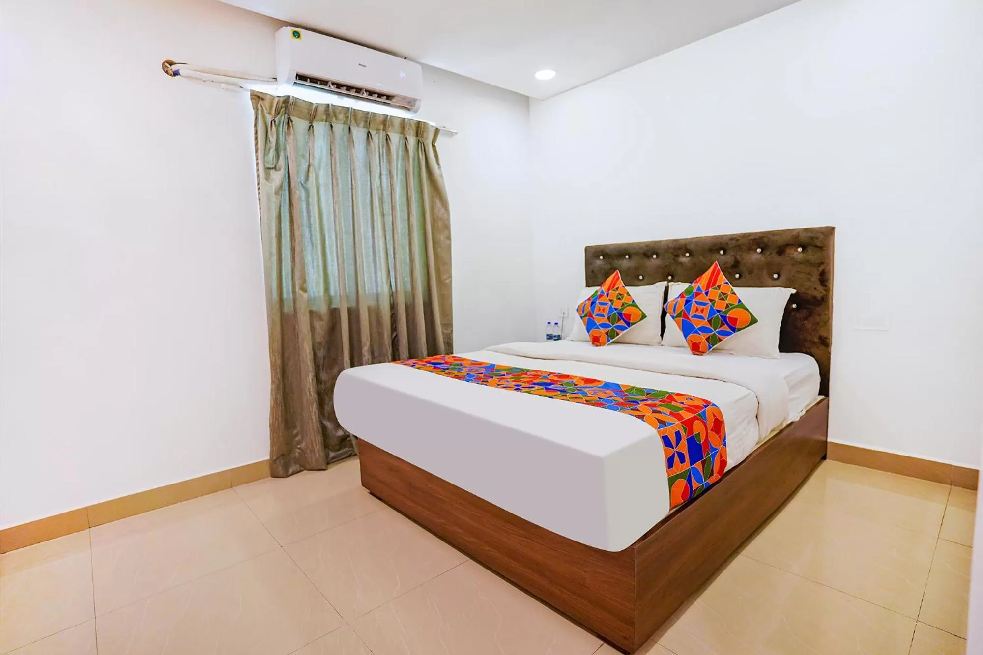 Bed in FabHotel Earth