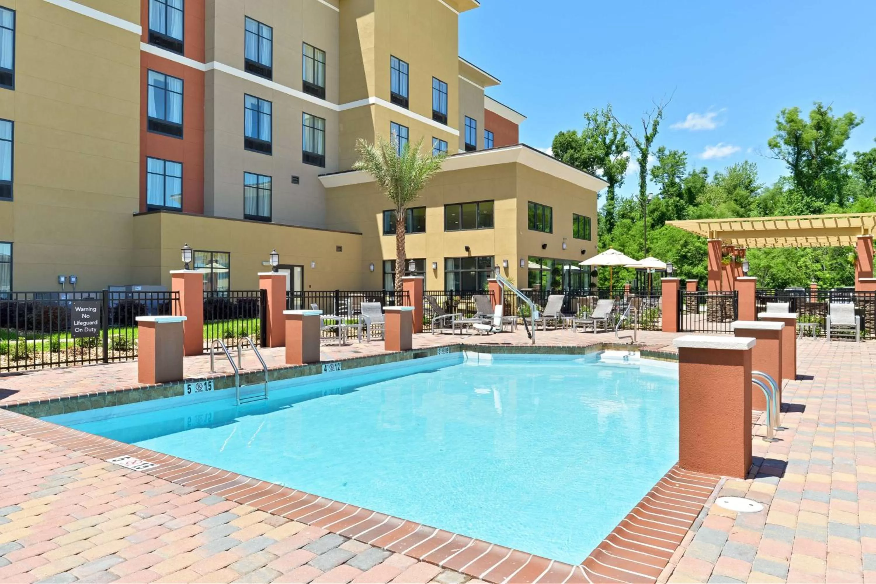 Pool view in Homewood Suites by Hilton Houma