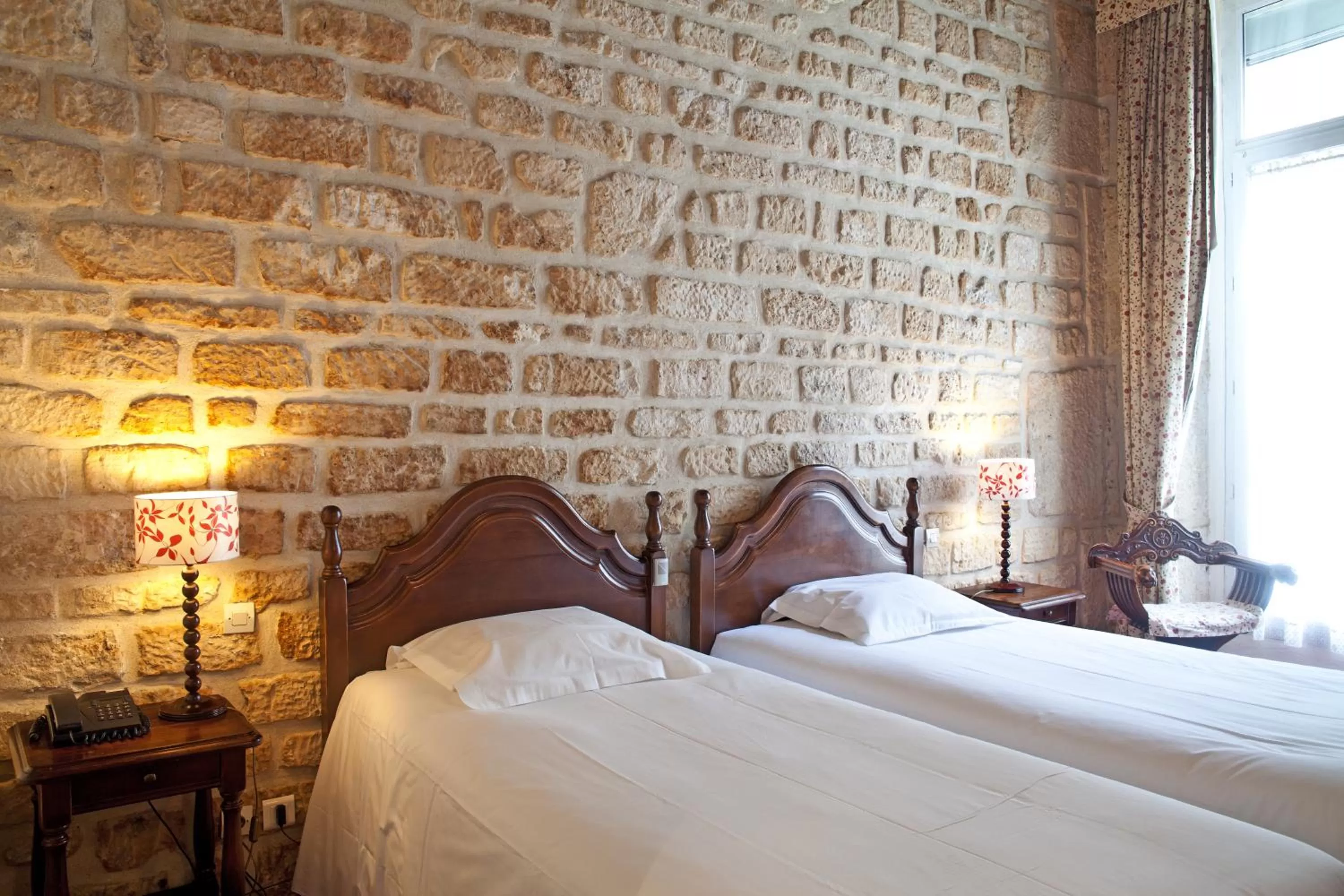 Bed in Tonic Hôtel du Louvre