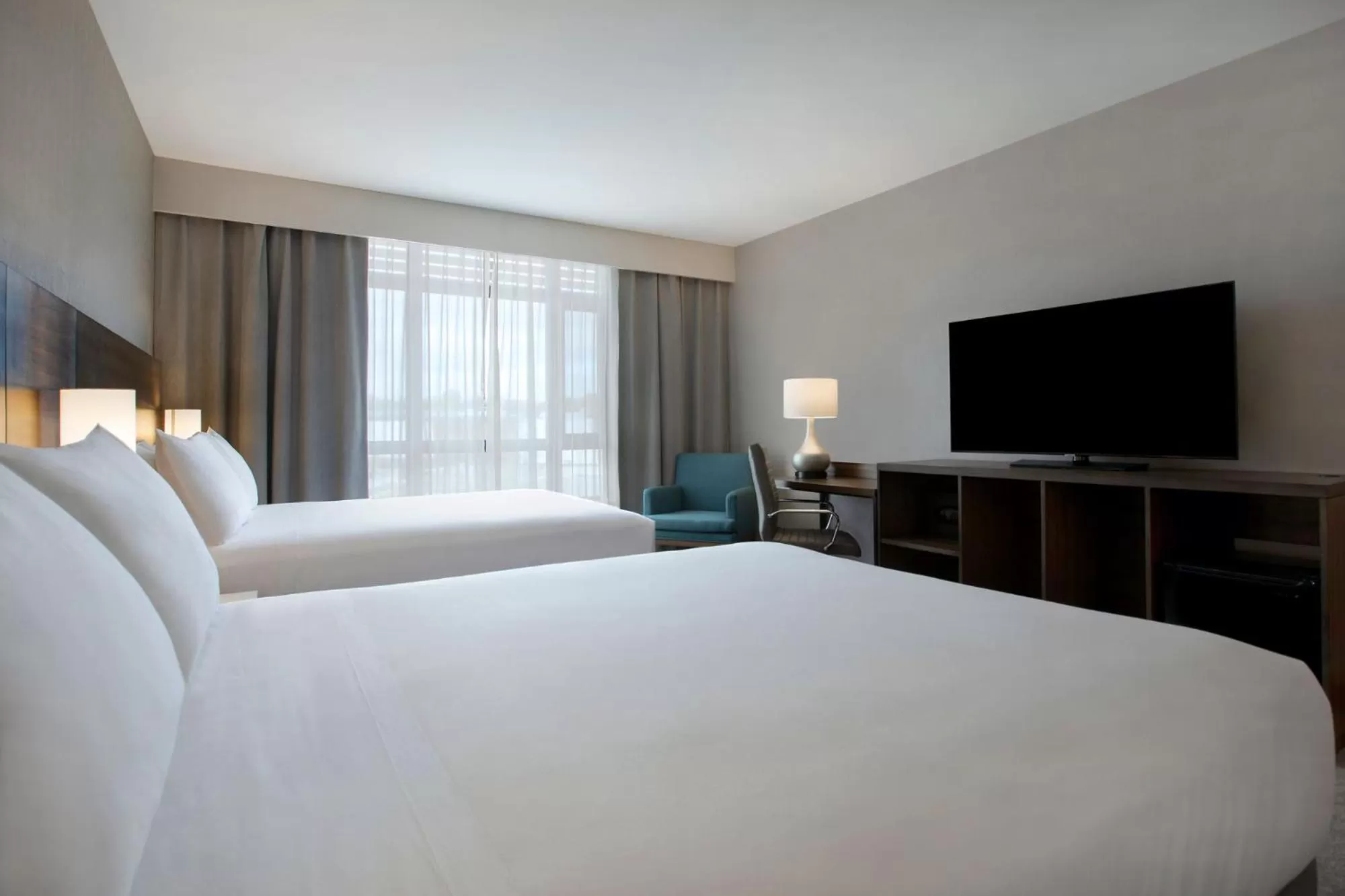 Bed in Great Blue Heron Hotel