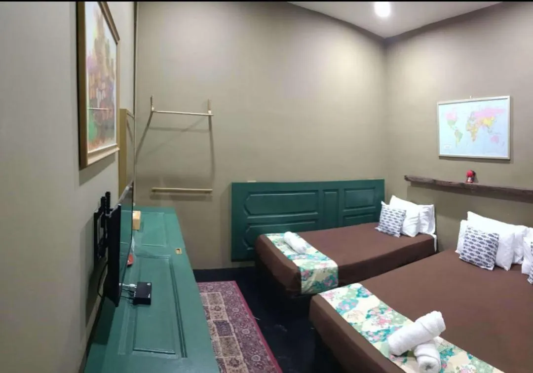 Triple Room in Oyasumi Hotel