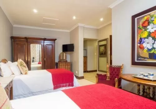 Bed in Issaquena Heights Boutique Hotel