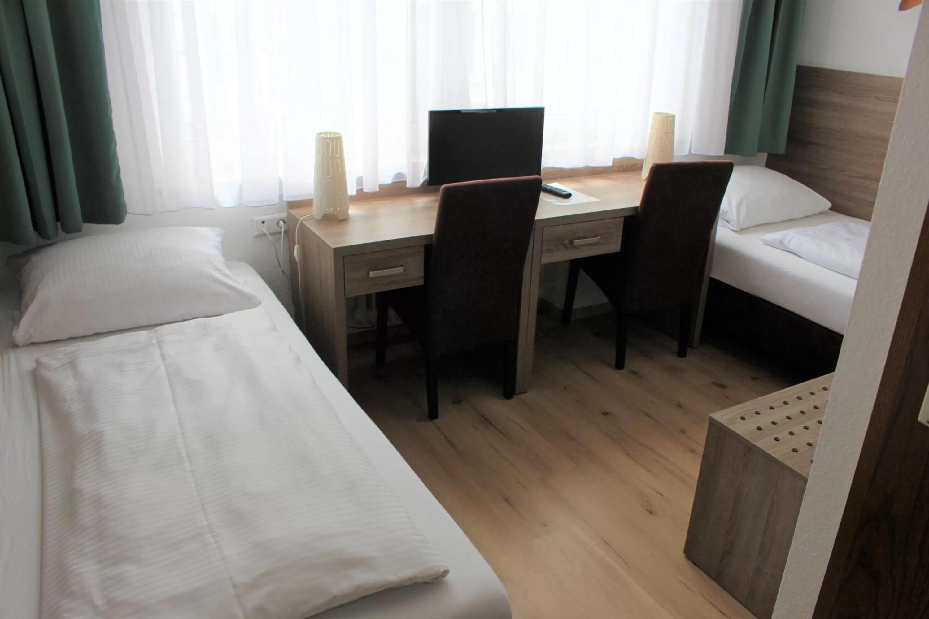 Bed in Hotel Ulmer Spatz