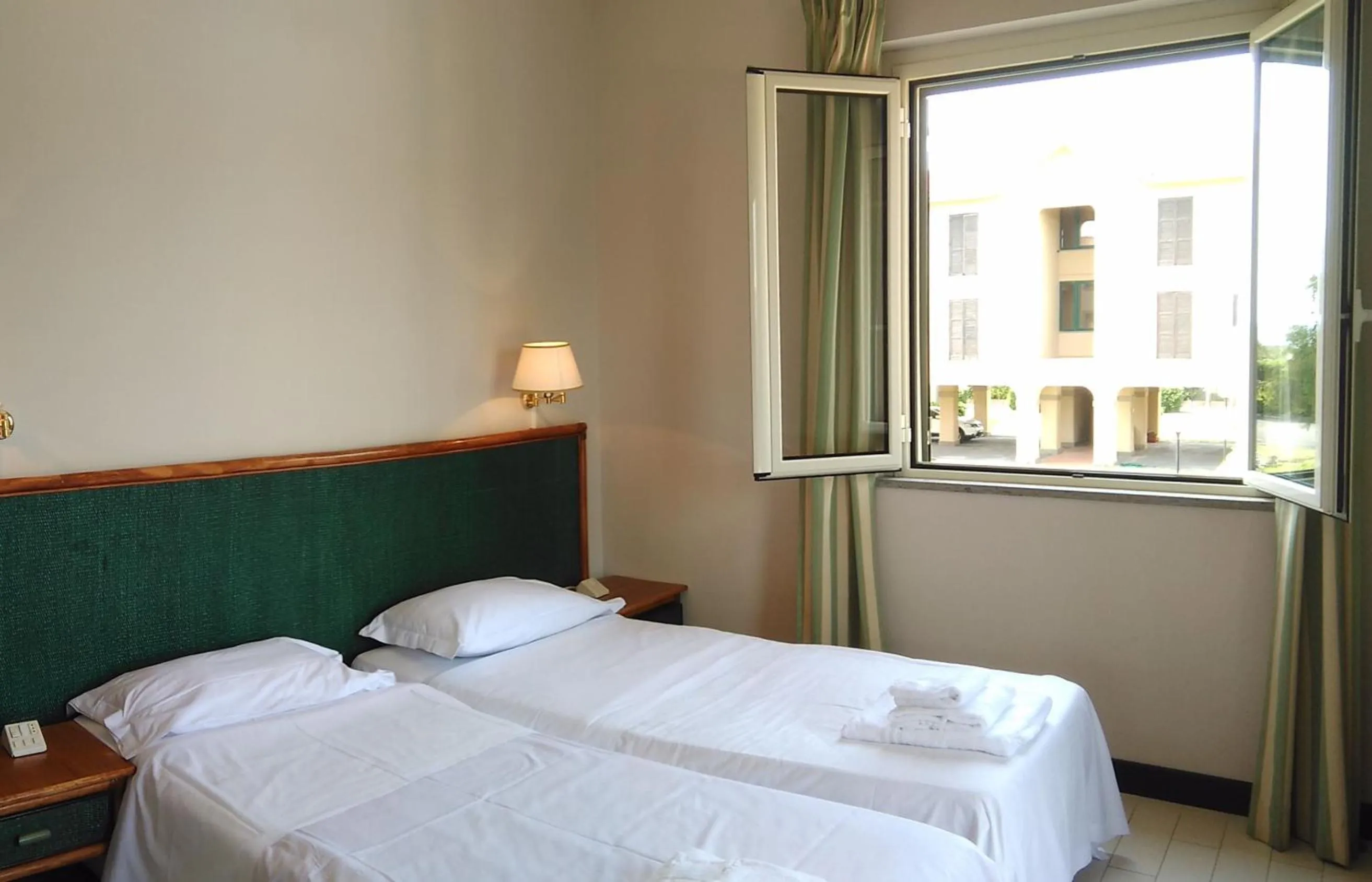 Bed in Hotel Baia Del Sole