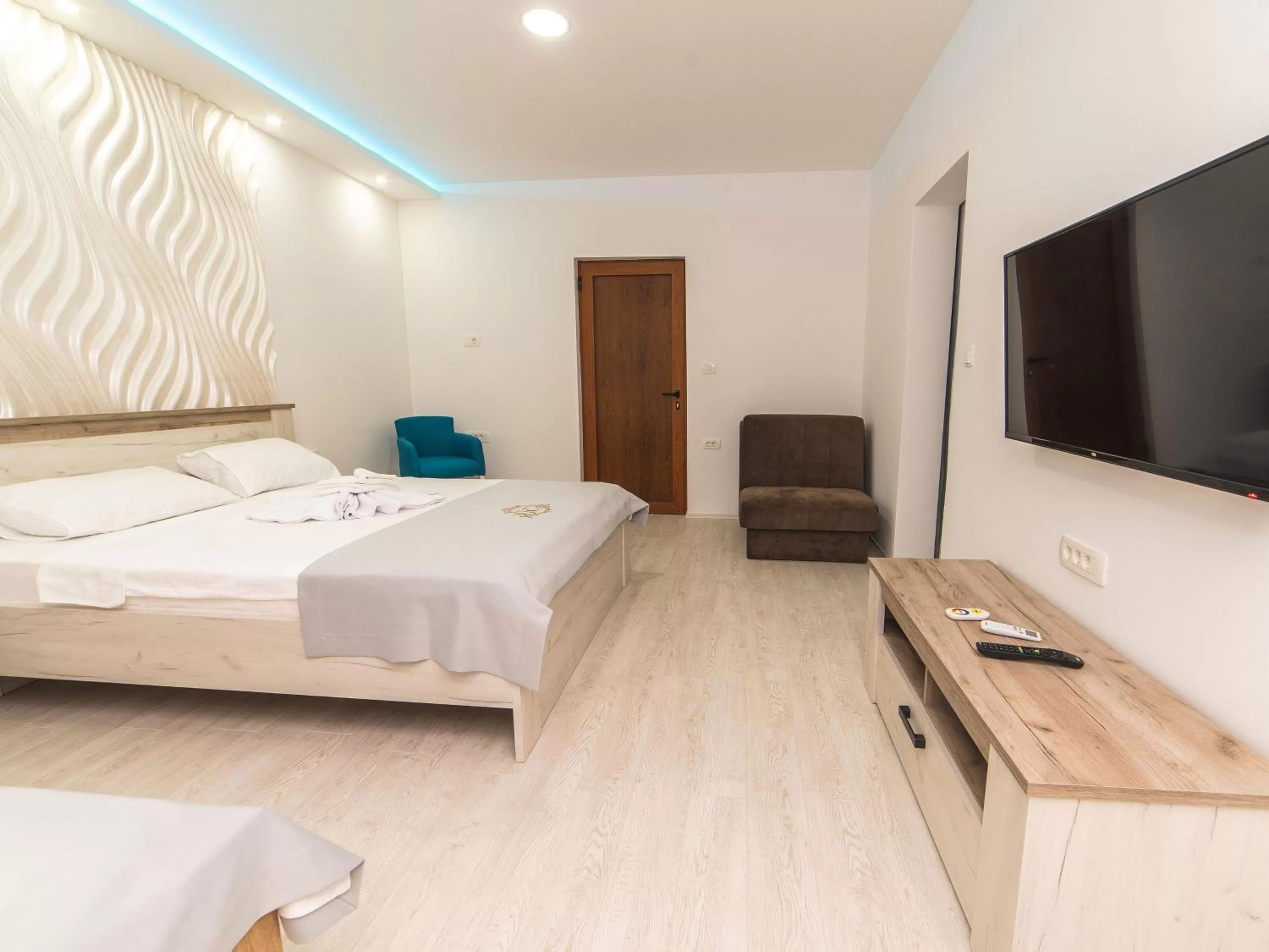 Bed in Hotel Royal Garden