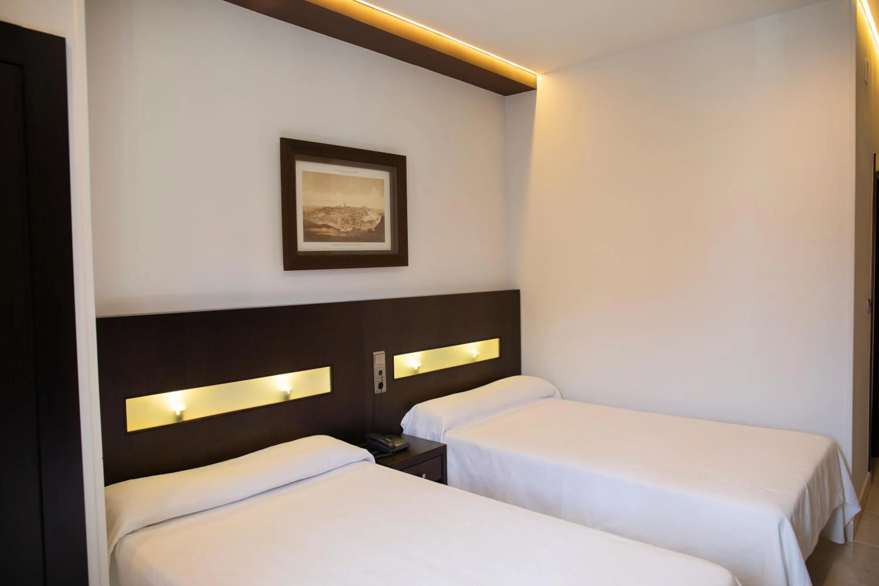 Bed in Hotel El Mesón