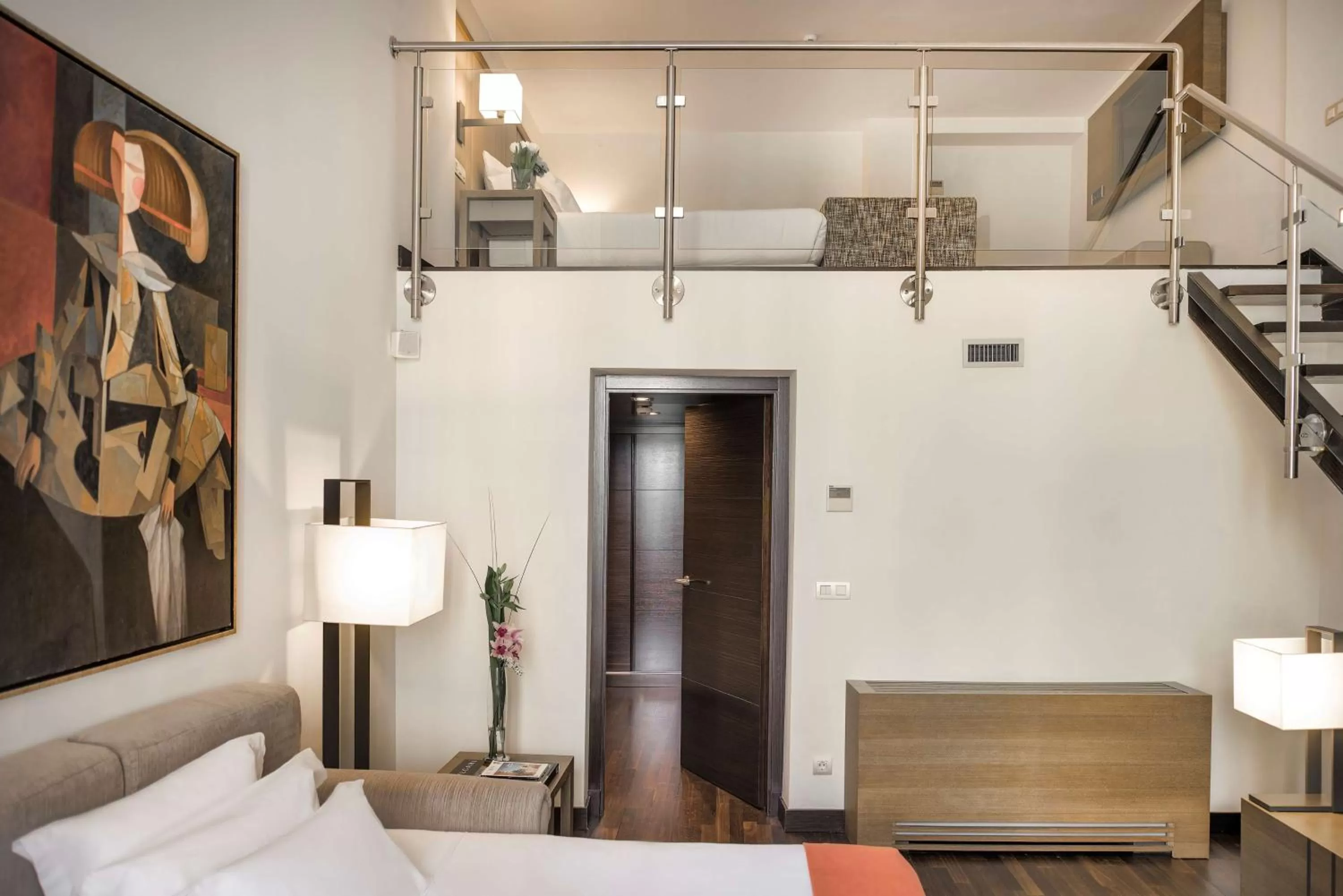 Junior Suite with sofa in NH Collection Madrid Palacio de Tepa