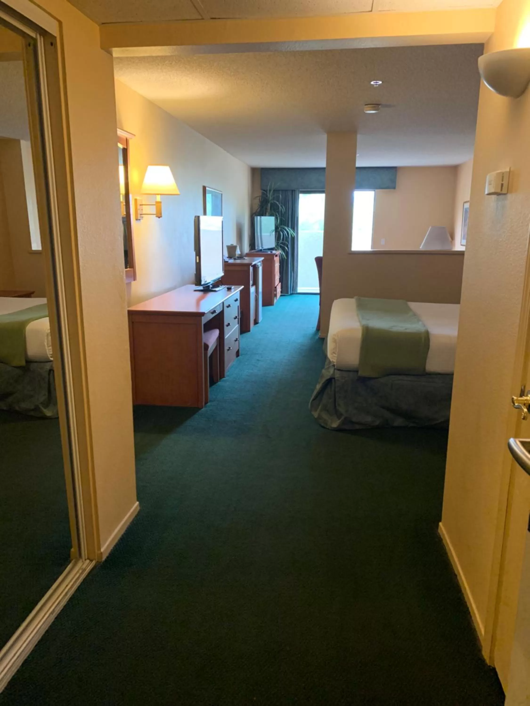 Bed in Miracle Springs Resort and Spa