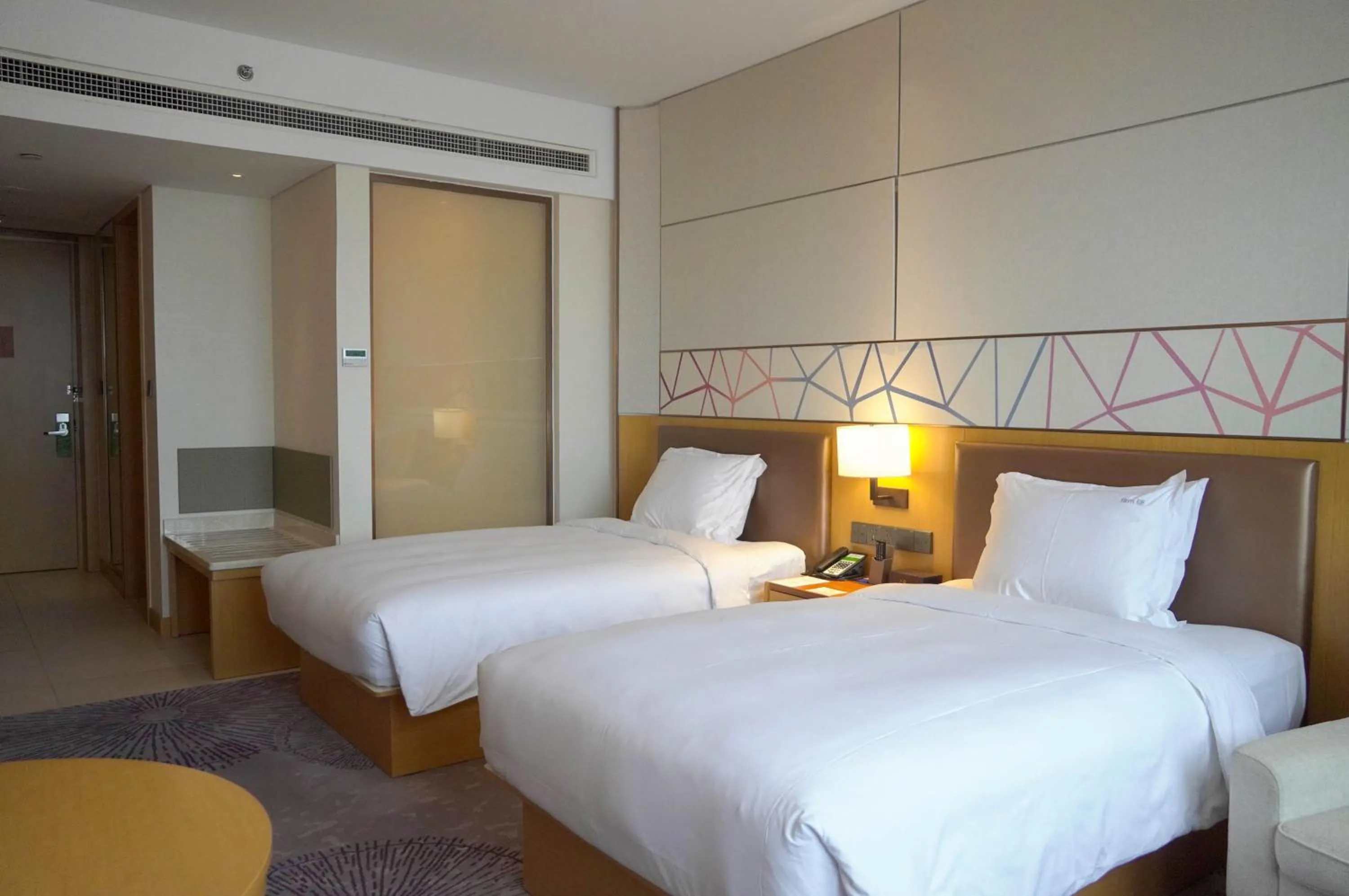 Bed in Holiday Inn Tianjin Xiqing by IHG