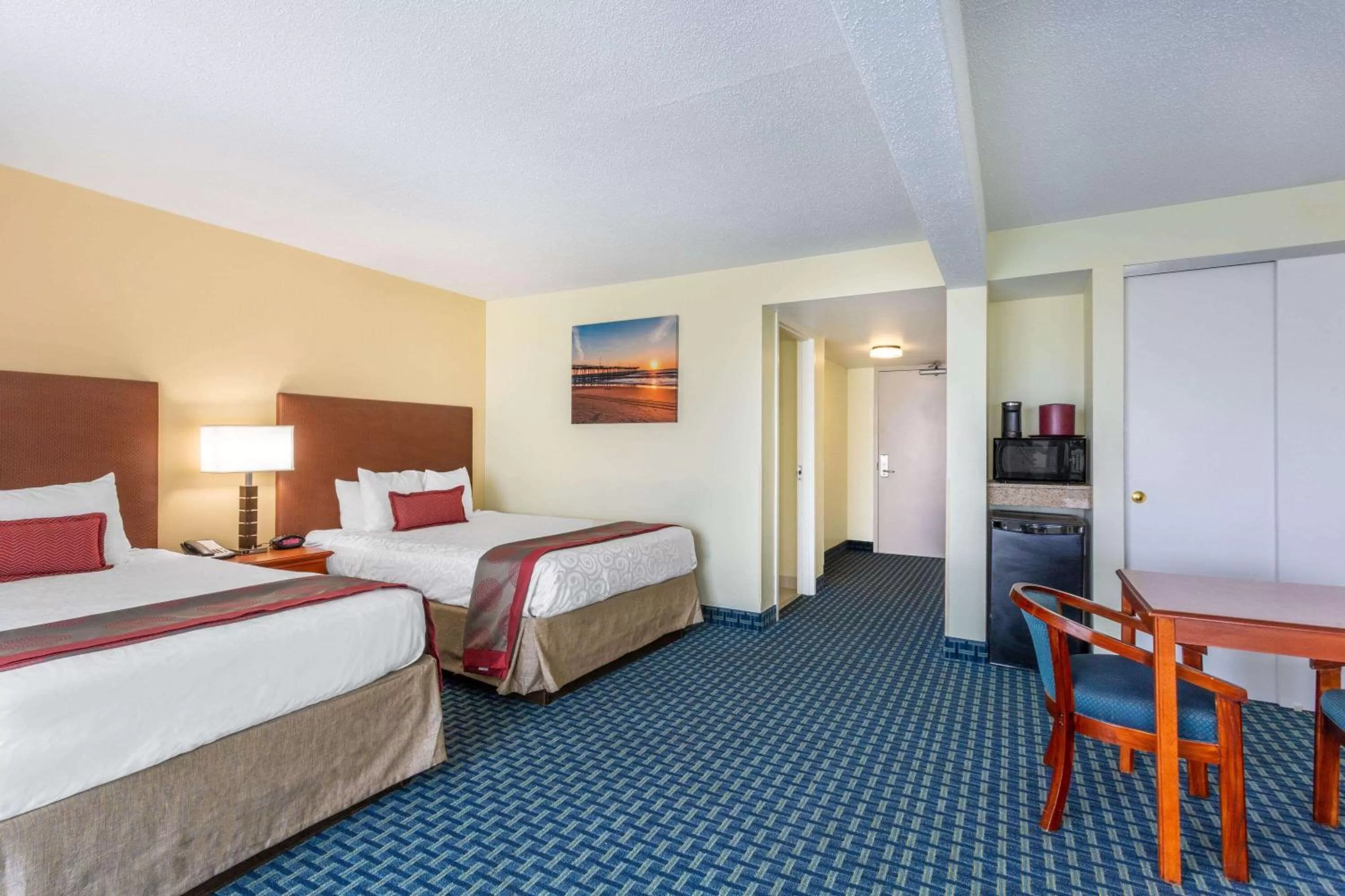 Photo of the whole room, Bed in Ramada Plaza by Wyndham Virginia Beach Oceanfront
