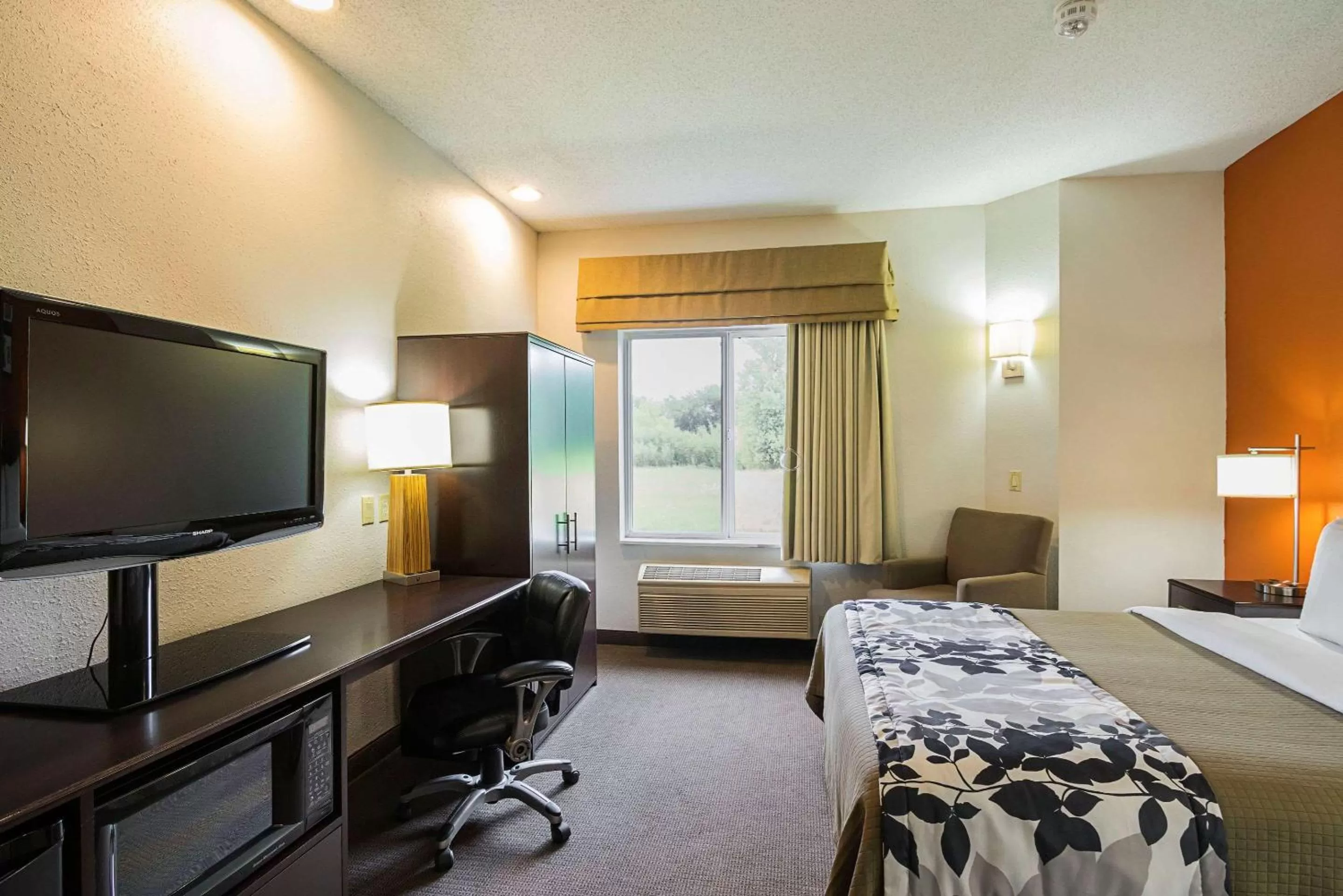 Photo of the whole room, Bed in Sleep Inn & Suites
