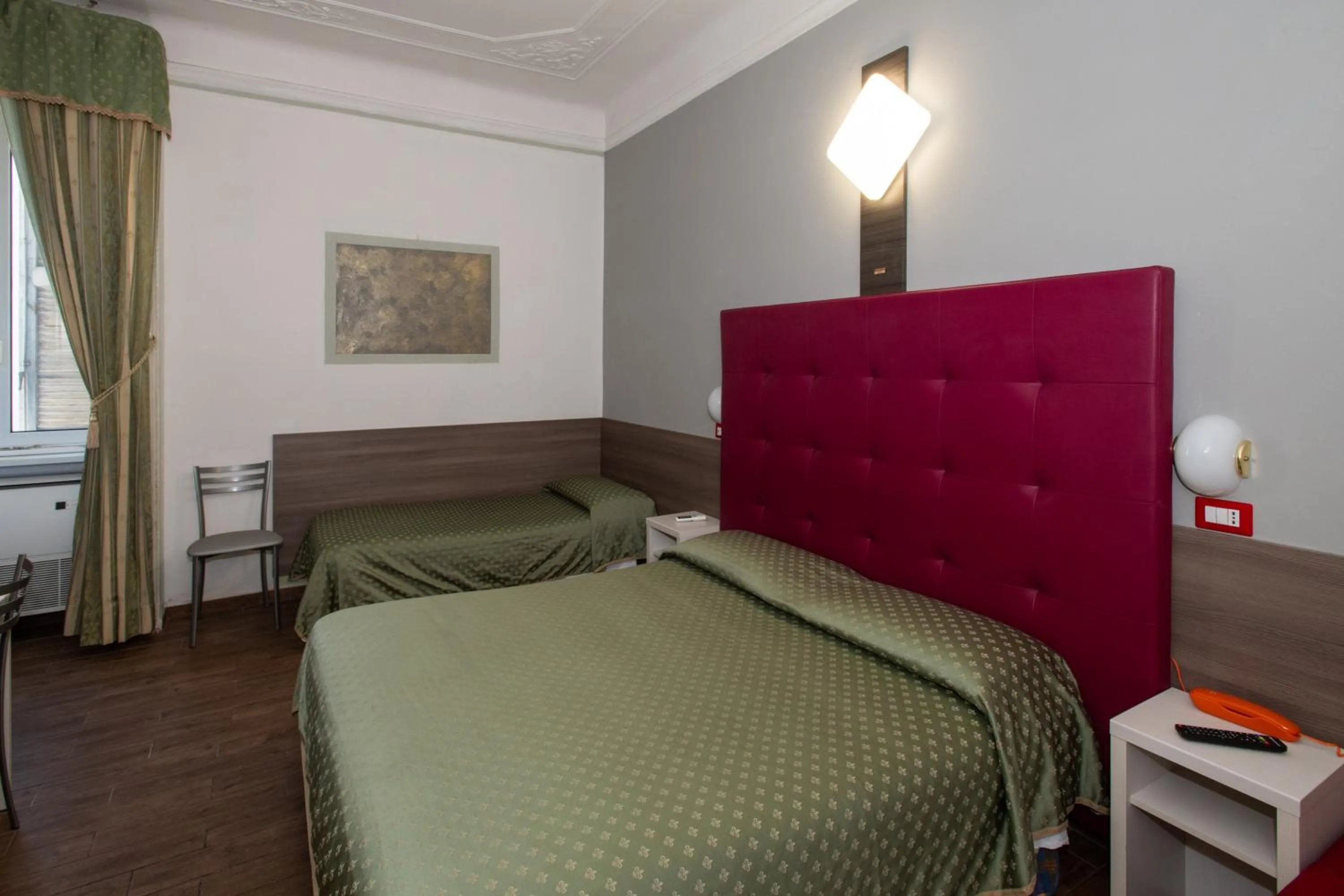 Bed in Hotel Piola