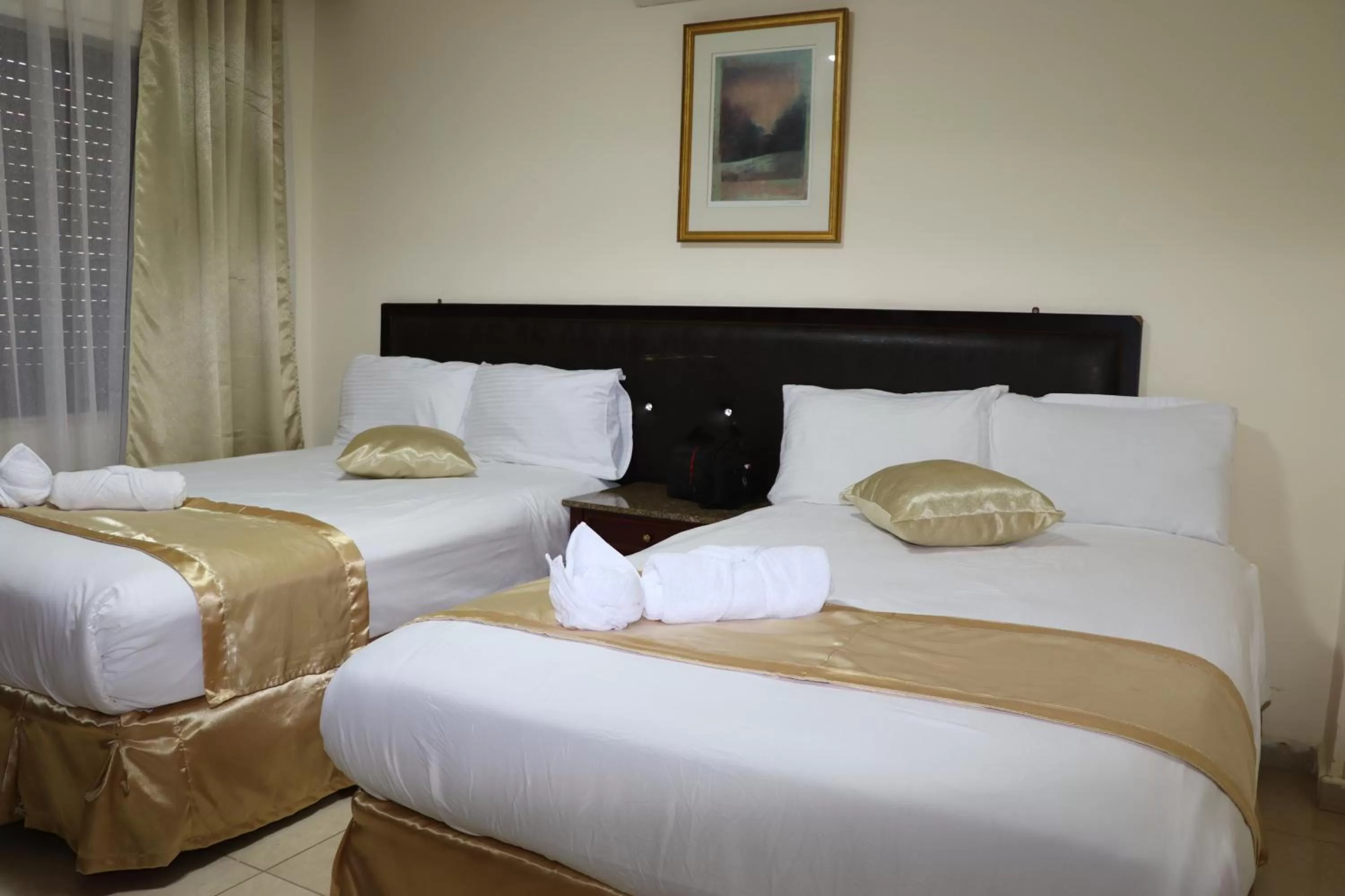 Bed in Al Jamal Suites