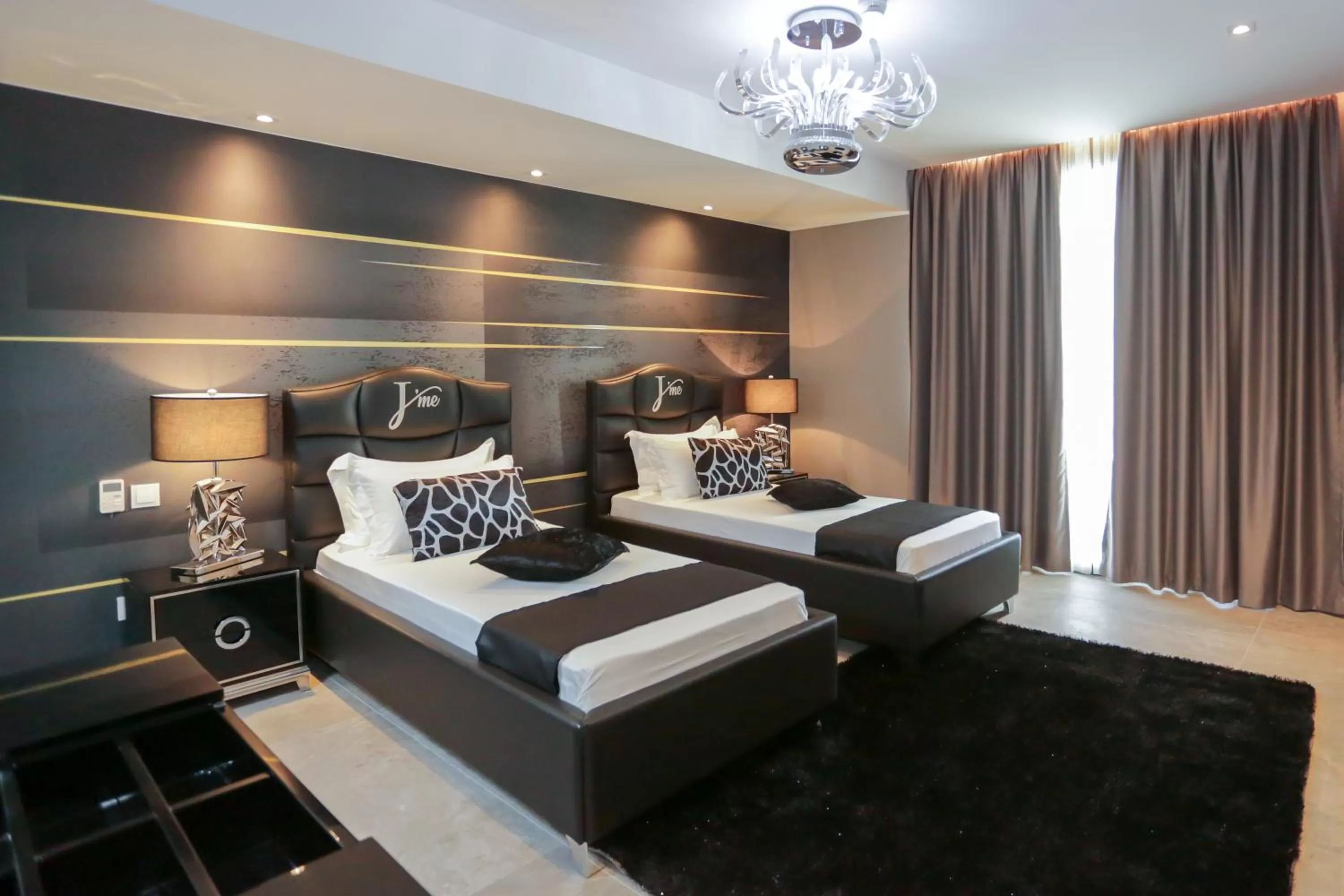 Seating area, Bed in J'Me Boutique Hotel - Adults only